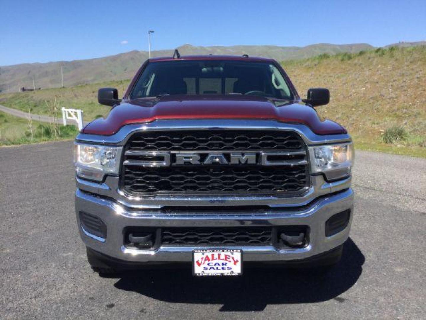 2019 Delmonico Red Pearlcoat /Diesel Gray/Black Ram 2500 Tradesman Crew Cab 4x4 8' Box (3C6UR5HL3KG) with an Cummins 6.7L I-6 diesel direct injection engine, 6-Speed Automatic transmission, located at 1801 Main Street, Lewiston, 83501, (208) 743-9371, 46.417065, -117.004799 - Photo#1