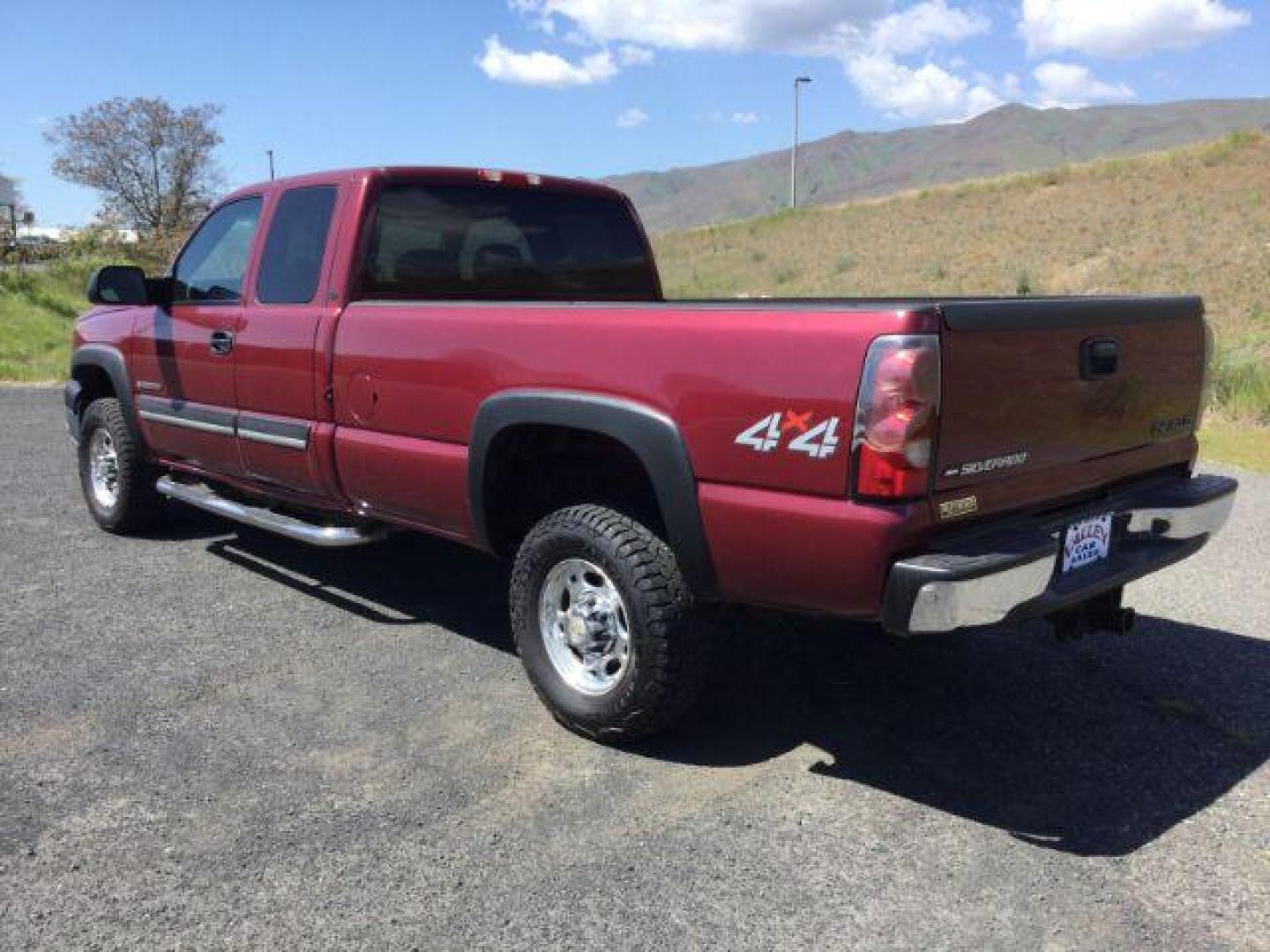 2004 Sport Red Metallic /Medium Gray Chevrolet Silverado 2500HD LT (1GCHK29U74E) with an Vortec 6L V-8 regular unleaded engine, 4 speed automatic transmission, located at 1801 Main Street, Lewiston, 83501, (208) 743-9371, 46.417065, -117.004799 - Photo#2