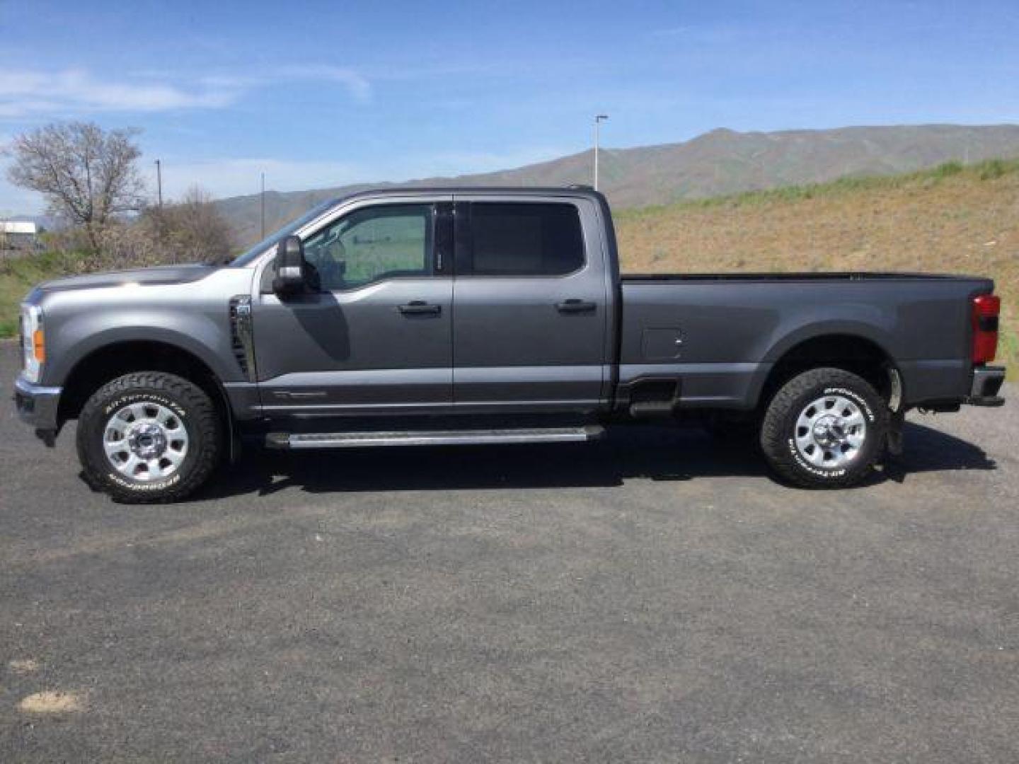 2023 Carbonized Gray Metallic /Medium Dark Slate Ford F-350 XLT (1FT8W3BT2PE) with an Powerstroke 6.7L V-8 diesel direct injection engine, 10 speed automatic transmission, located at 1801 Main Street, Lewiston, 83501, (208) 743-9371, 46.417065, -117.004799 - Photo#2