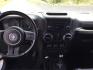2012 Bright Silver Metallic Clearcoat /Black Jeep Wrangler Unlimited Sport (1C4BJWDG2CL) with an 3.6L V-6 DOHC engine, 5-Speed Automatic transmission, located at 1801 Main Street, Lewiston, 83501, (208) 743-9371, 46.417065, -117.004799 - Photo#5