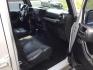 2012 Bright Silver Metallic Clearcoat /Black Jeep Wrangler Unlimited Sport (1C4BJWDG2CL) with an 3.6L V-6 DOHC engine, 5-Speed Automatic transmission, located at 1801 Main Street, Lewiston, 83501, (208) 743-9371, 46.417065, -117.004799 - Photo#9