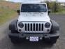 2012 Bright Silver Metallic Clearcoat /Black Jeep Wrangler Unlimited Sport (1C4BJWDG2CL) with an 3.6L V-6 DOHC engine, 5-Speed Automatic transmission, located at 1801 Main Street, Lewiston, 83501, (208) 743-9371, 46.417065, -117.004799 - Photo#11