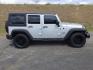 2012 Bright Silver Metallic Clearcoat /Black Jeep Wrangler Unlimited Sport (1C4BJWDG2CL) with an 3.6L V-6 DOHC engine, 5-Speed Automatic transmission, located at 1801 Main Street, Lewiston, 83501, (208) 743-9371, 46.417065, -117.004799 - Photo#12
