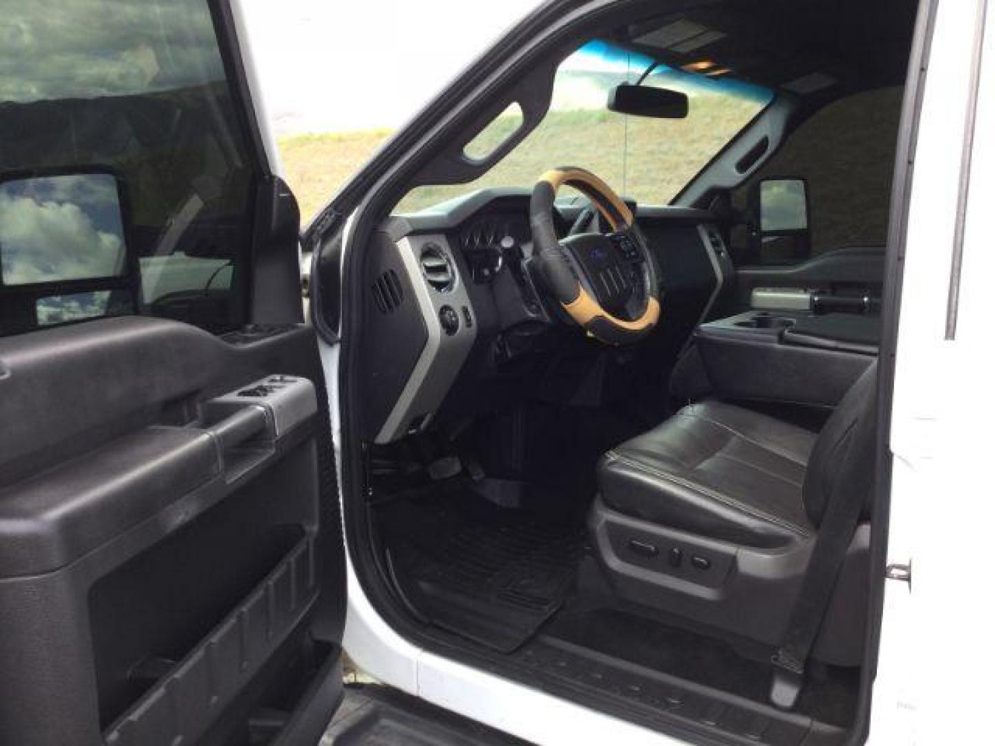 2015 Oxford White /Black Ford F-350 Crew Cab Lariat 4x4 (1FT8W3BT2FE) with an Powerstroke 6.7L V-8 diesel direct injection engine, 6-Speed Automatic transmission, located at 1801 Main Street, Lewiston, 83501, (208) 743-9371, 46.417065, -117.004799 - Photo#3