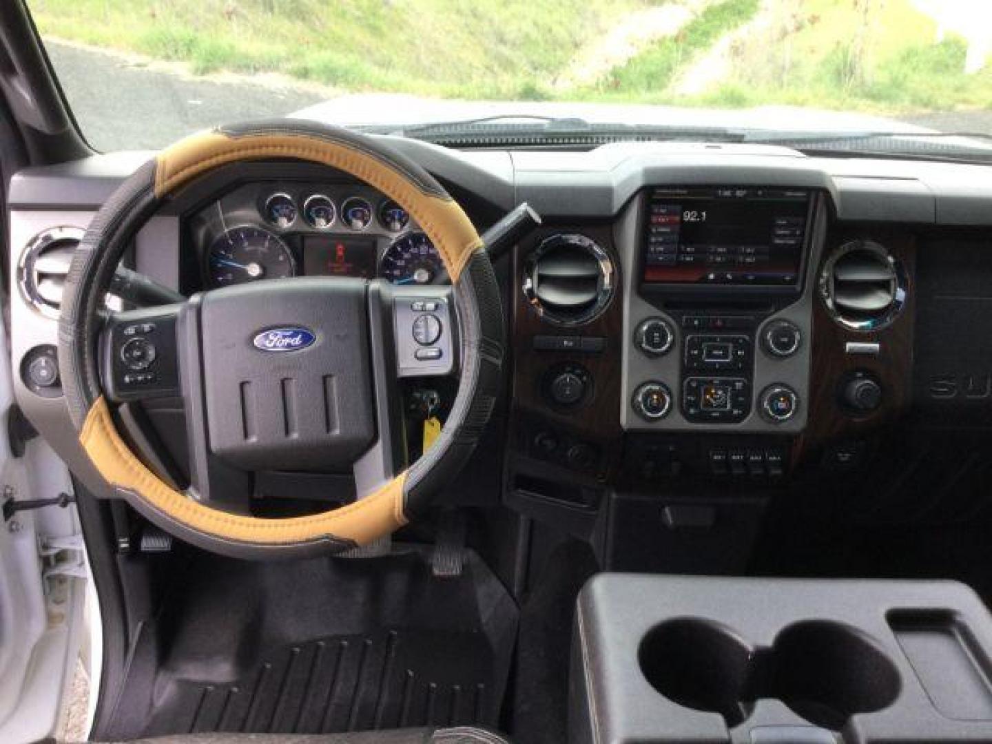 2015 Oxford White /Black Ford F-350 Crew Cab Lariat 4x4 (1FT8W3BT2FE) with an Powerstroke 6.7L V-8 diesel direct injection engine, 6-Speed Automatic transmission, located at 1801 Main Street, Lewiston, 83501, (208) 743-9371, 46.417065, -117.004799 - Photo#7