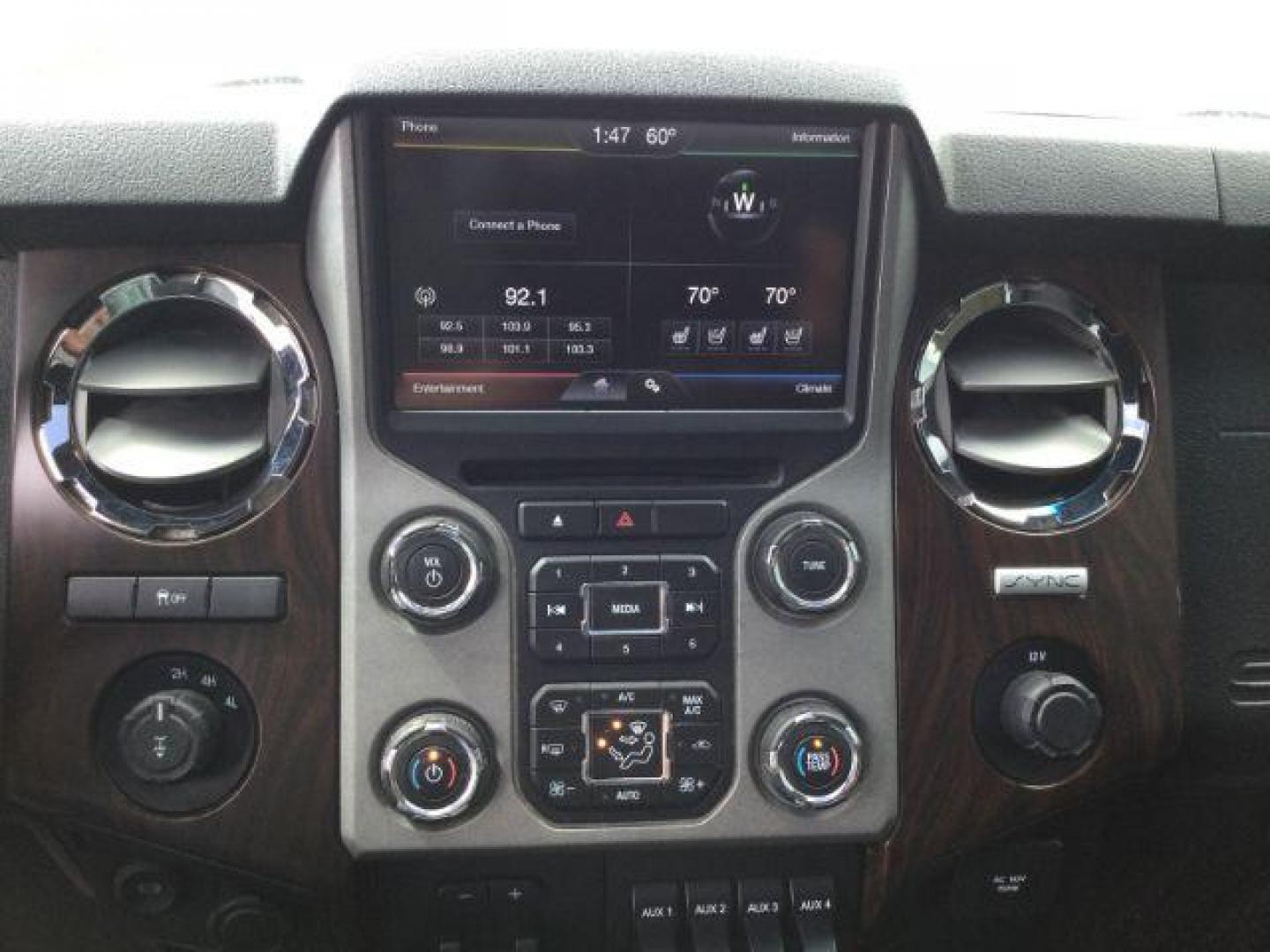 2015 Oxford White /Black Ford F-350 Crew Cab Lariat 4x4 (1FT8W3BT2FE) with an Powerstroke 6.7L V-8 diesel direct injection engine, 6-Speed Automatic transmission, located at 1801 Main Street, Lewiston, 83501, (208) 743-9371, 46.417065, -117.004799 - Photo#10