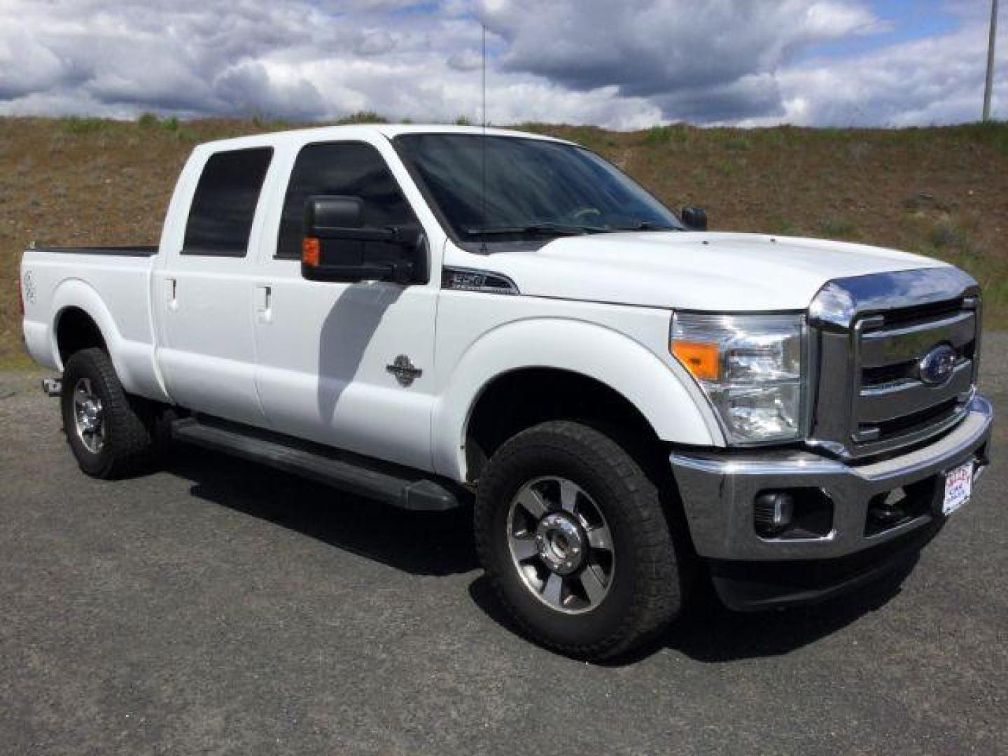 2015 Oxford White /Black Ford F-350 Crew Cab Lariat 4x4 (1FT8W3BT2FE) with an Powerstroke 6.7L V-8 diesel direct injection engine, 6-Speed Automatic transmission, located at 1801 Main Street, Lewiston, 83501, (208) 743-9371, 46.417065, -117.004799 - Photo#15