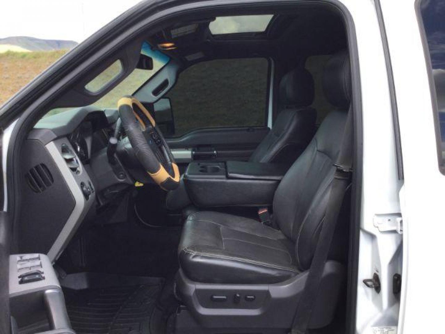 2015 Oxford White /Black Ford F-350 Crew Cab Lariat 4x4 (1FT8W3BT2FE) with an Powerstroke 6.7L V-8 diesel direct injection engine, 6-Speed Automatic transmission, located at 1801 Main Street, Lewiston, 83501, (208) 743-9371, 46.417065, -117.004799 - Photo#17