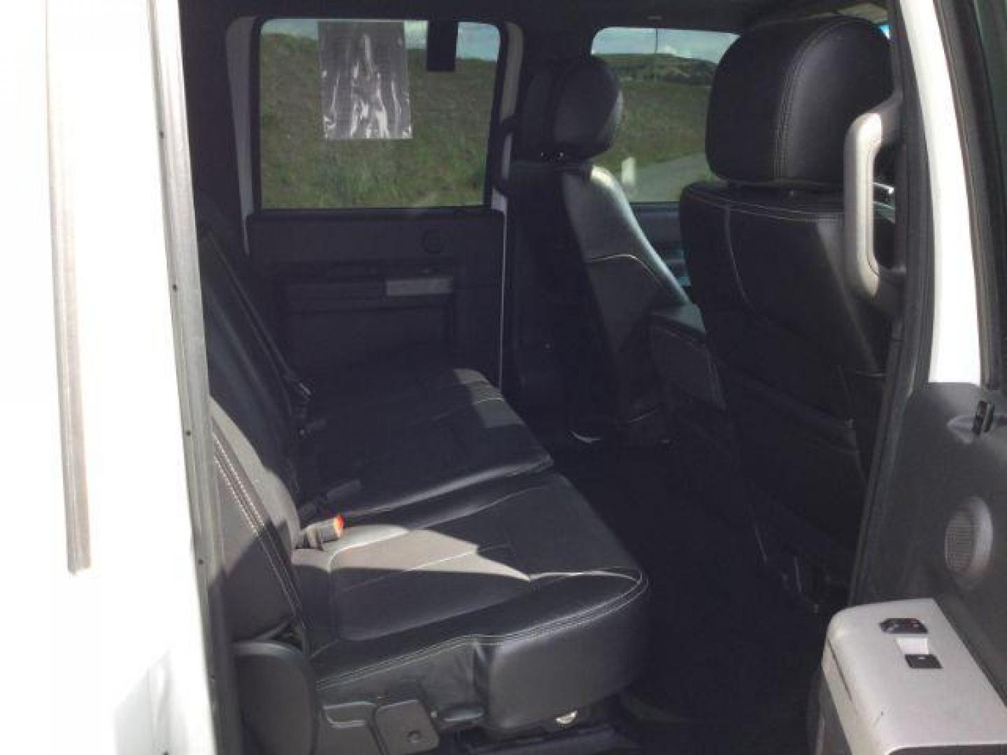 2015 Oxford White /Black Ford F-350 Crew Cab Lariat 4x4 (1FT8W3BT2FE) with an Powerstroke 6.7L V-8 diesel direct injection engine, 6-Speed Automatic transmission, located at 1801 Main Street, Lewiston, 83501, (208) 743-9371, 46.417065, -117.004799 - Photo#18