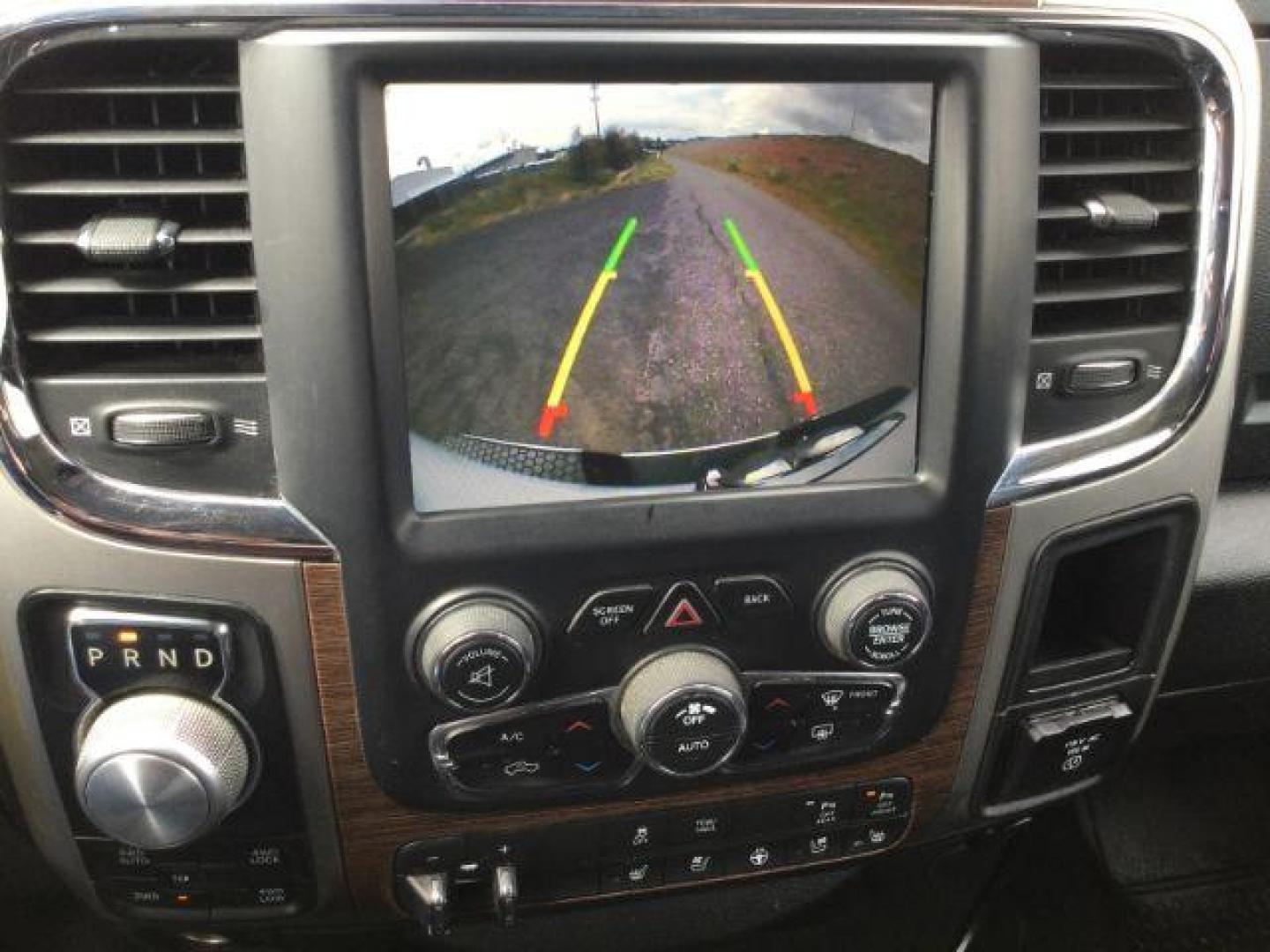 2017 Bright White /Black Ram 1500 Laramie (1C6RR7VT1HS) with an HEMI 5.7L V-8 variable valve control engine, 8-Speed Automatic transmission, located at 1801 Main Street, Lewiston, 83501, (208) 743-9371, 46.417065, -117.004799 - Photo#9