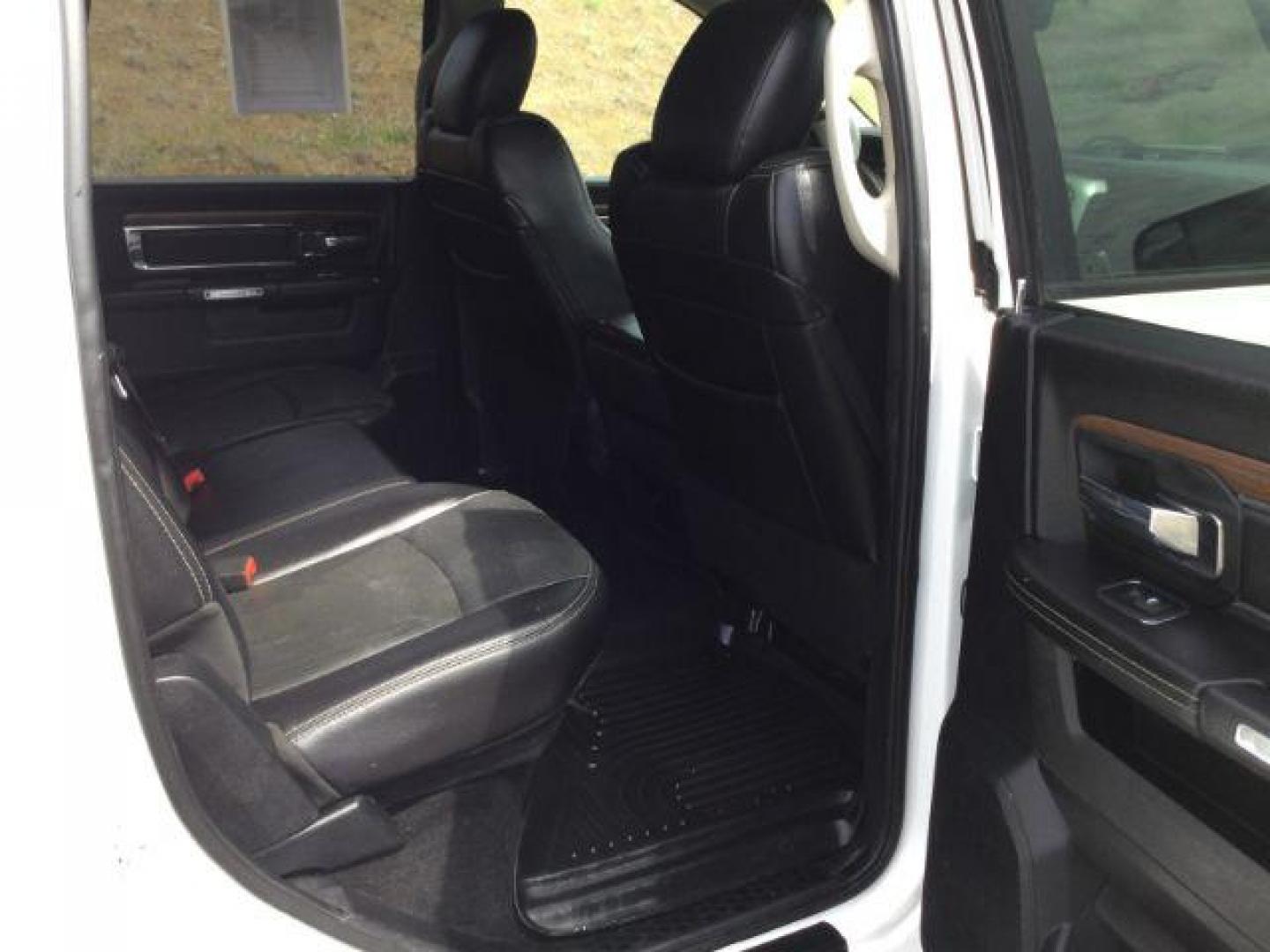 2017 Bright White /Black Ram 1500 Laramie (1C6RR7VT1HS) with an HEMI 5.7L V-8 variable valve control engine, 8-Speed Automatic transmission, located at 1801 Main Street, Lewiston, 83501, (208) 743-9371, 46.417065, -117.004799 - Photo#14