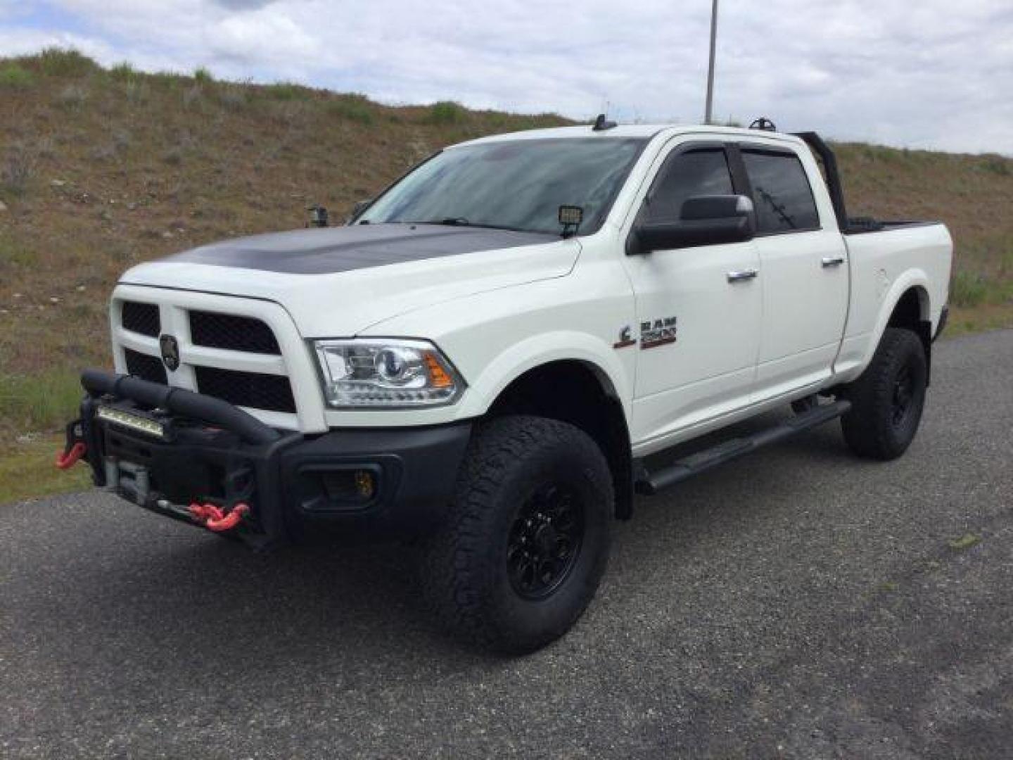 2016 Pearl White /Black Ram 2500 Laramie (3C6UR5FL3GG) with an Cummins 6.7L I-6 diesel direct injection engine, 6-Speed Automatic transmission, located at 1801 Main Street, Lewiston, 83501, (208) 743-9371, 46.417065, -117.004799 - Photo#0
