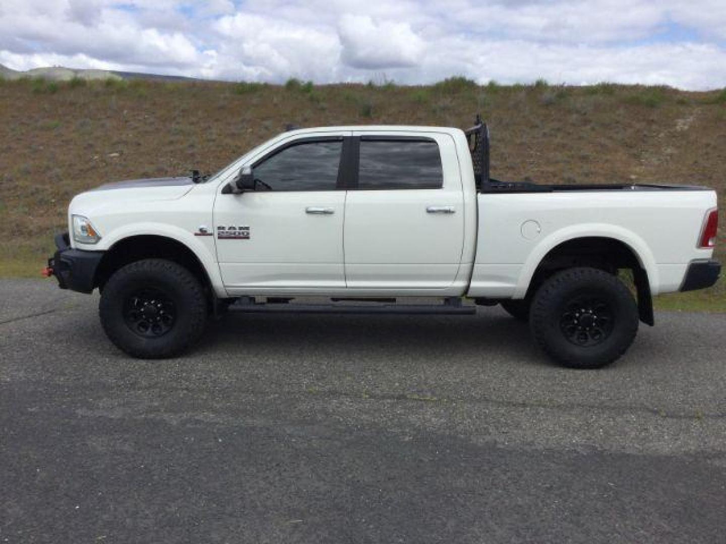 2016 Pearl White /Black Ram 2500 Laramie (3C6UR5FL3GG) with an Cummins 6.7L I-6 diesel direct injection engine, 6-Speed Automatic transmission, located at 1801 Main Street, Lewiston, 83501, (208) 743-9371, 46.417065, -117.004799 - Photo#1