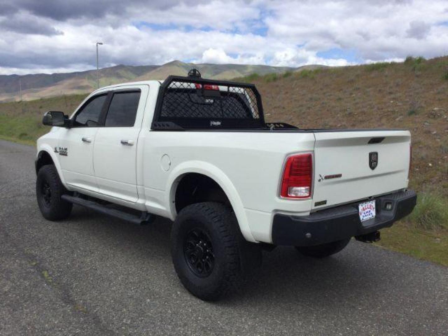 2016 Pearl White /Black Ram 2500 Laramie (3C6UR5FL3GG) with an Cummins 6.7L I-6 diesel direct injection engine, 6-Speed Automatic transmission, located at 1801 Main Street, Lewiston, 83501, (208) 743-9371, 46.417065, -117.004799 - Photo#4