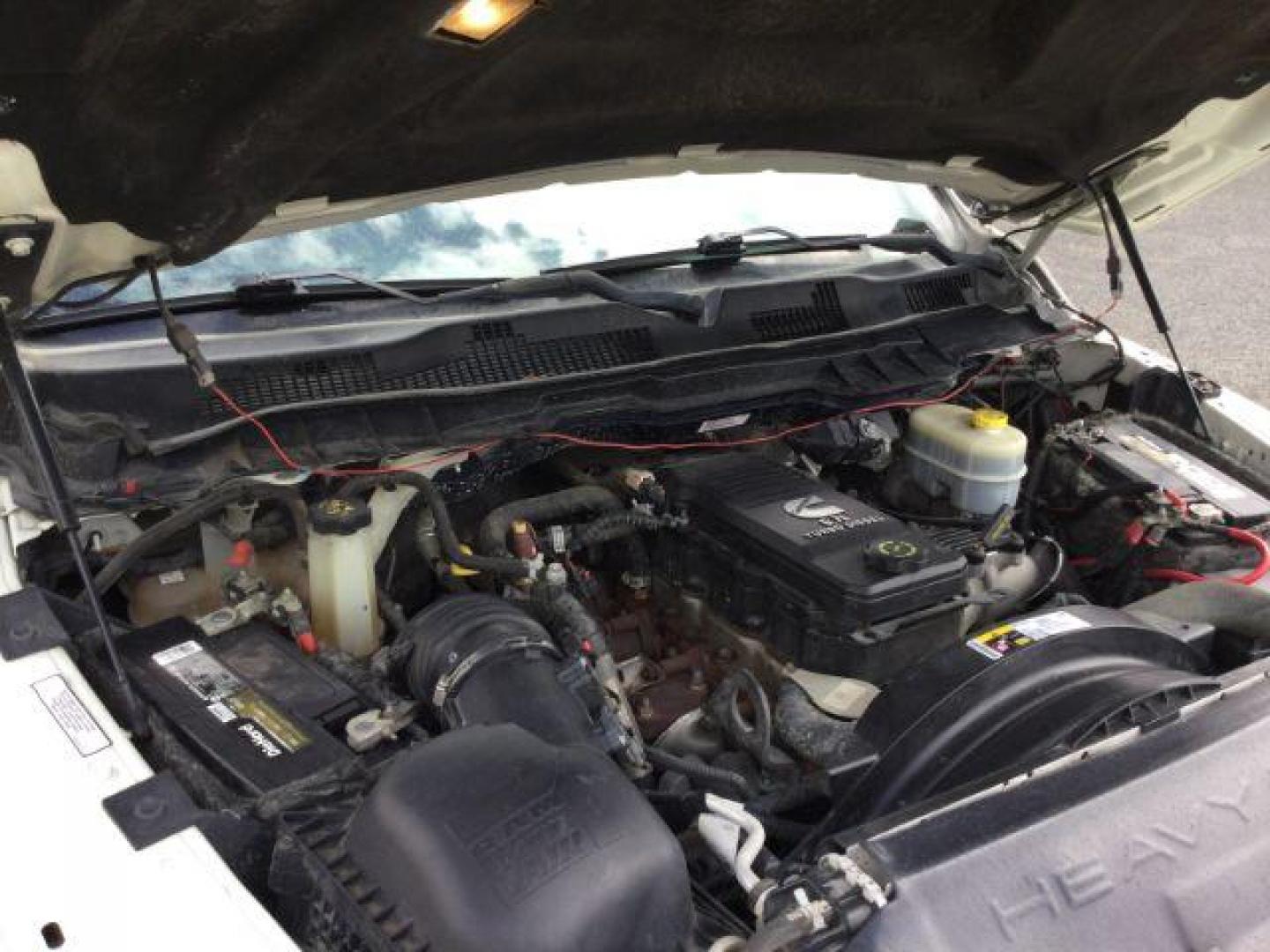 2016 Pearl White /Black Ram 2500 Laramie (3C6UR5FL3GG) with an Cummins 6.7L I-6 diesel direct injection engine, 6-Speed Automatic transmission, located at 1801 Main Street, Lewiston, 83501, (208) 743-9371, 46.417065, -117.004799 - Photo#11