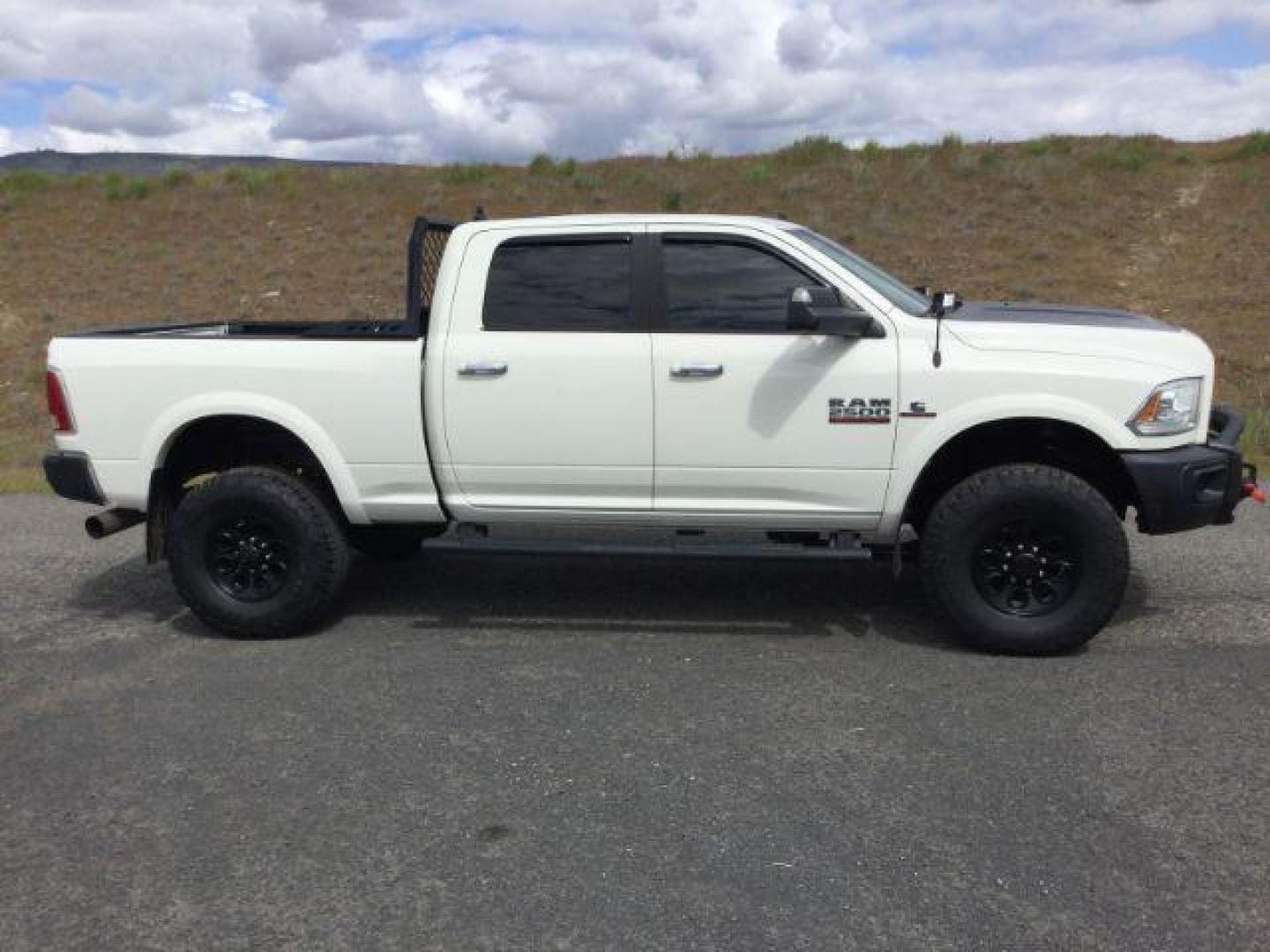 2016 Pearl White /Black Ram 2500 Laramie (3C6UR5FL3GG) with an Cummins 6.7L I-6 diesel direct injection engine, 6-Speed Automatic transmission, located at 1801 Main Street, Lewiston, 83501, (208) 743-9371, 46.417065, -117.004799 - Photo#16