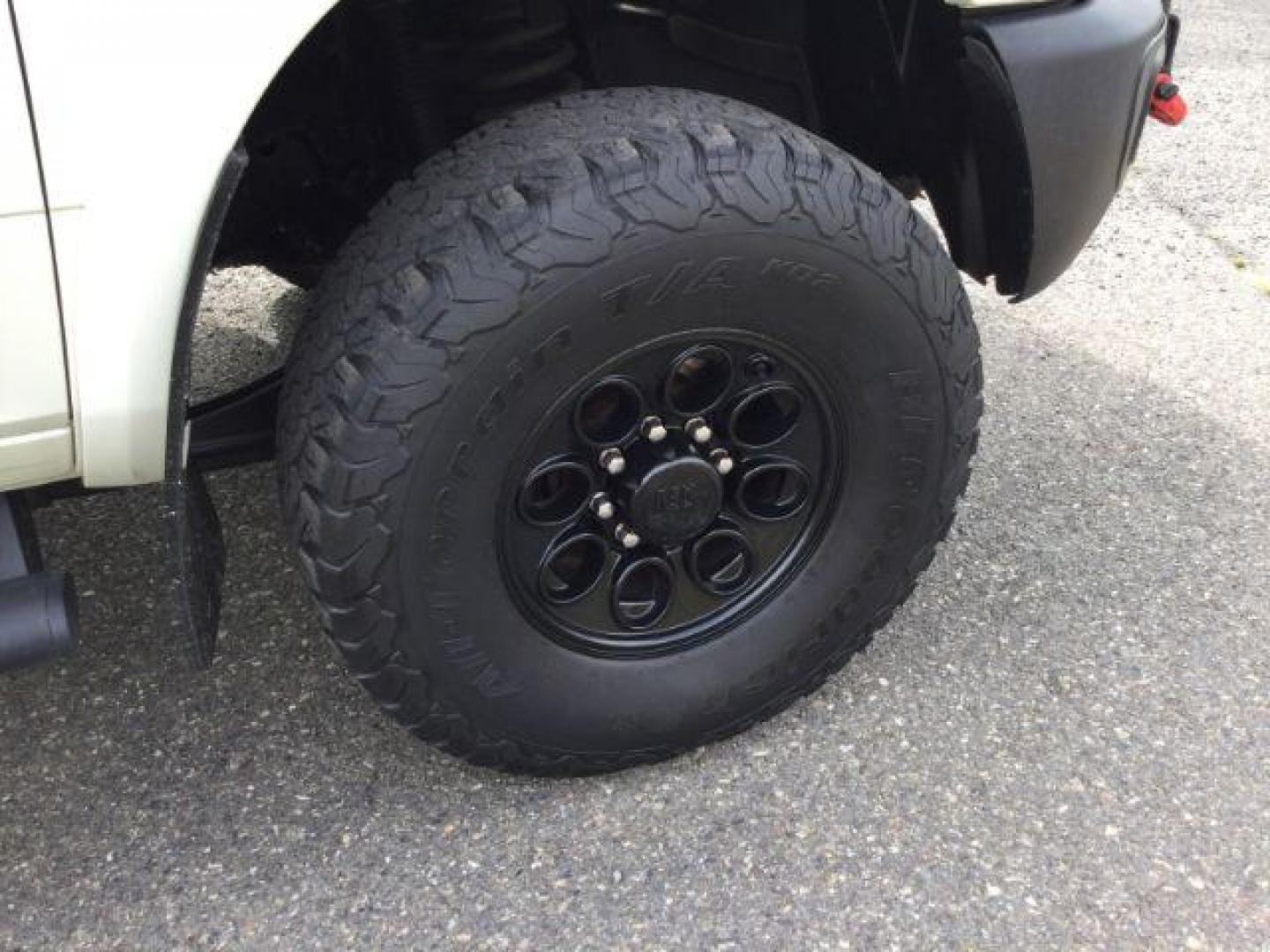 2016 Pearl White /Black Ram 2500 Laramie (3C6UR5FL3GG) with an Cummins 6.7L I-6 diesel direct injection engine, 6-Speed Automatic transmission, located at 1801 Main Street, Lewiston, 83501, (208) 743-9371, 46.417065, -117.004799 - Photo#21