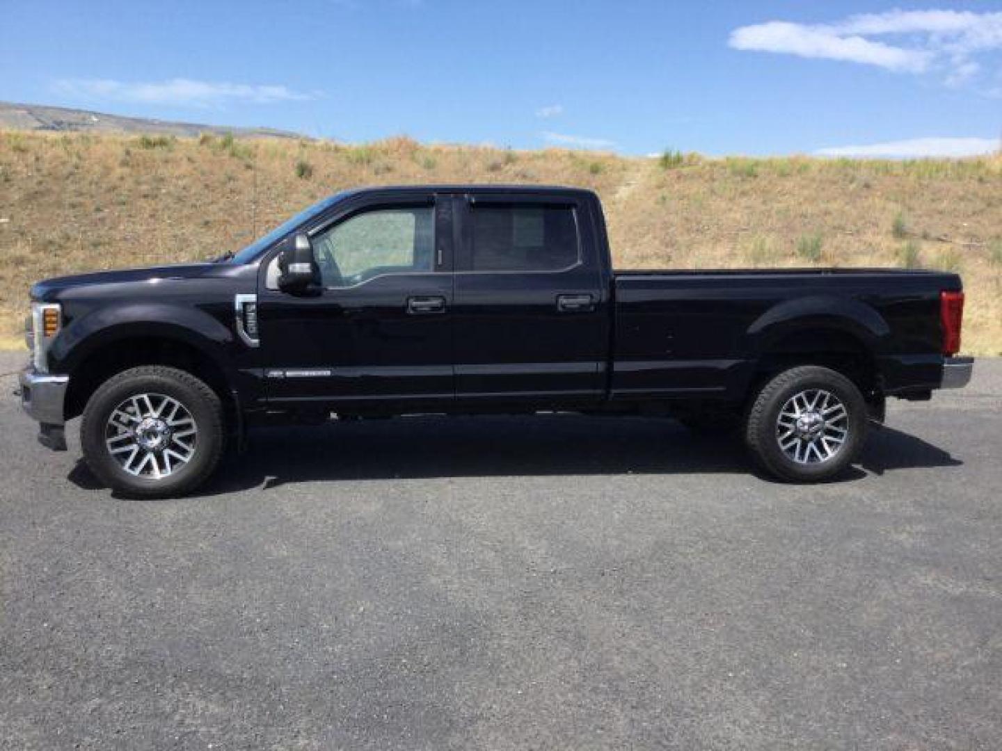 2019 Agate Black /Medium Earth Gray Ford F-350 XLT Crew Cab 4WD (1FT8W3BT1KE) with an Powerstroke 6.7L V-8 diesel direct injection engine, 6-SPEED AUTOMATIC transmission, located at 1801 Main Street, Lewiston, 83501, (208) 743-9371, 46.417065, -117.004799 - Photo#2
