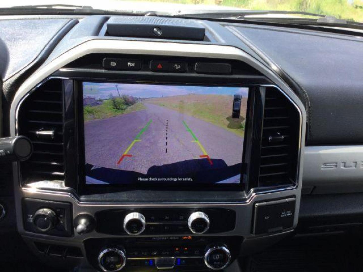 2022 Star White Metallic Tri-Coat /Black Onyx Ford F-350 Lariat Crew Cab 4WD (1FT8W3BT1NE) with an Powerstroke 6.7L V-8 diesel direct injection engine, 10 speed automatic transmission, located at 1801 Main Street, Lewiston, 83501, (208) 743-9371, 46.417065, -117.004799 - Photo#22