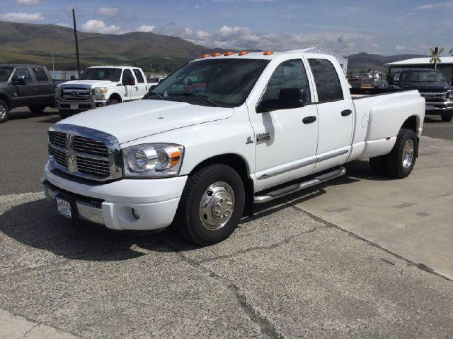 2008 Bright White Clearcoat /Khaki Dodge Ram 3500 Laramie (3D7ML48A98G) with an Cummins 6.7L I-6 diesel direct injection engine, 6-Speed Automatic transmission, located at 1801 Main Street, Lewiston, 83501, (208) 743-9371, 46.417065, -117.004799 - Photo#0