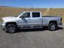 2017 Quicksilver Metallic /Cocoa/Dark Sand GMC Sierra 3500HD Denali (1GT42YEY1HF) with an Duramax 6.6L V-8 diesel direct injection engine, 6-Speed Automatic transmission, located at 1801 Main Street, Lewiston, 83501, (208) 743-9371, 46.417065, -117.004799 - Photo#2