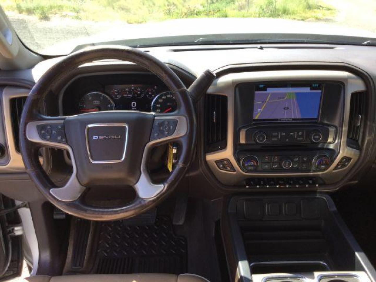 2017 Quicksilver Metallic /Cocoa/Dark Sand GMC Sierra 3500HD Denali (1GT42YEY1HF) with an Duramax 6.6L V-8 diesel direct injection engine, 6-Speed Automatic transmission, located at 1801 Main Street, Lewiston, 83501, (208) 743-9371, 46.417065, -117.004799 - Photo#5