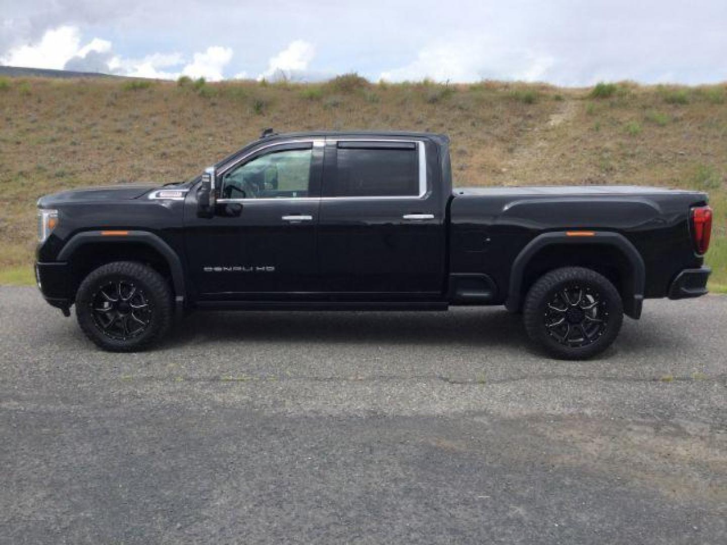 2021 Onyx Black /Jet Black GMC Sierra 3500HD Denali (1GT49WEY9MF) with an Duramax 6.6L V-8 diesel direct injection engine, 10-speed automatic transmission, located at 1801 Main Street, Lewiston, 83501, (208) 743-9371, 46.417065, -117.004799 - Photo#1