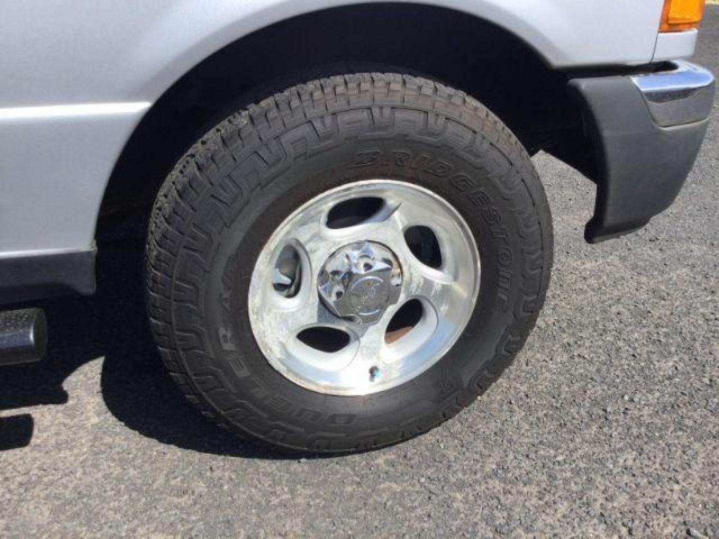 2004 Silver Clearcoat Metallic /Black/Gray cloth Ford Ranger XLT 4x4 (1FTZR45E64P) with an 4L V-6 regular unleaded engine, automatic transmission, located at 1801 Main Street, Lewiston, 83501, (208) 743-9371, 46.417065, -117.004799 - Photo#17