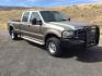 2004 Arizona Beige Metallic /Castano Leather Interior Ford F-350 Lariat Crew Cab Long Bed 4WD (1FTSW31P94E) with an 6.0L V8 OHV 32V TURBO DIESEL engine, 6-Speed Manual transmission, located at 1801 Main Street, Lewiston, 83501, (208) 743-9371, 46.417065, -117.004799 - Photo#0
