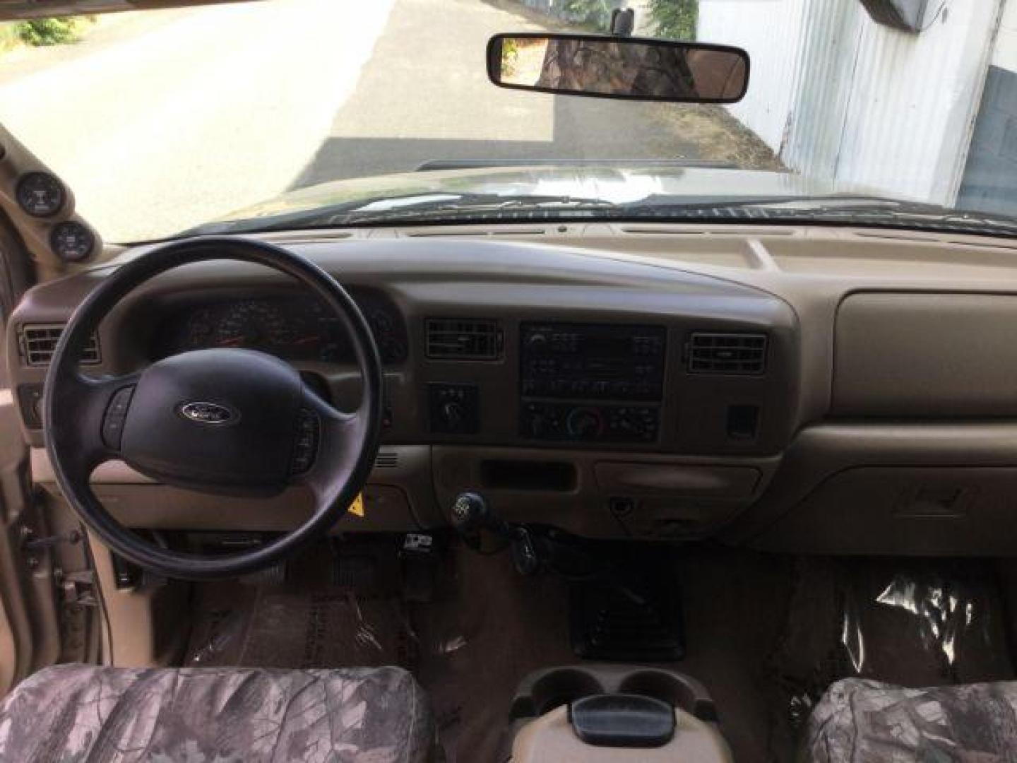 2004 Arizona Beige Metallic /Castano Leather Interior Ford F-350 Lariat Crew Cab Long Bed 4WD (1FTSW31P94E) with an 6.0L V8 OHV 32V TURBO DIESEL engine, 6-Speed Manual transmission, located at 1801 Main Street, Lewiston, 83501, (208) 743-9371, 46.417065, -117.004799 - Photo#7