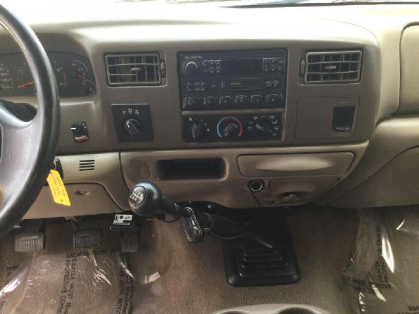 2004 Arizona Beige Metallic /Castano Leather Interior Ford F-350 Lariat Crew Cab Long Bed 4WD (1FTSW31P94E) with an 6.0L V8 OHV 32V TURBO DIESEL engine, 6-Speed Manual transmission, located at 1801 Main Street, Lewiston, 83501, (208) 743-9371, 46.417065, -117.004799 - Photo#8