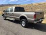 2004 Arizona Beige Metallic /Castano Leather Interior Ford F-350 Lariat Crew Cab Long Bed 4WD (1FTSW31P94E) with an 6.0L V8 OHV 32V TURBO DIESEL engine, 6-Speed Manual transmission, located at 1801 Main Street, Lewiston, 83501, (208) 743-9371, 46.417065, -117.004799 - Photo#12