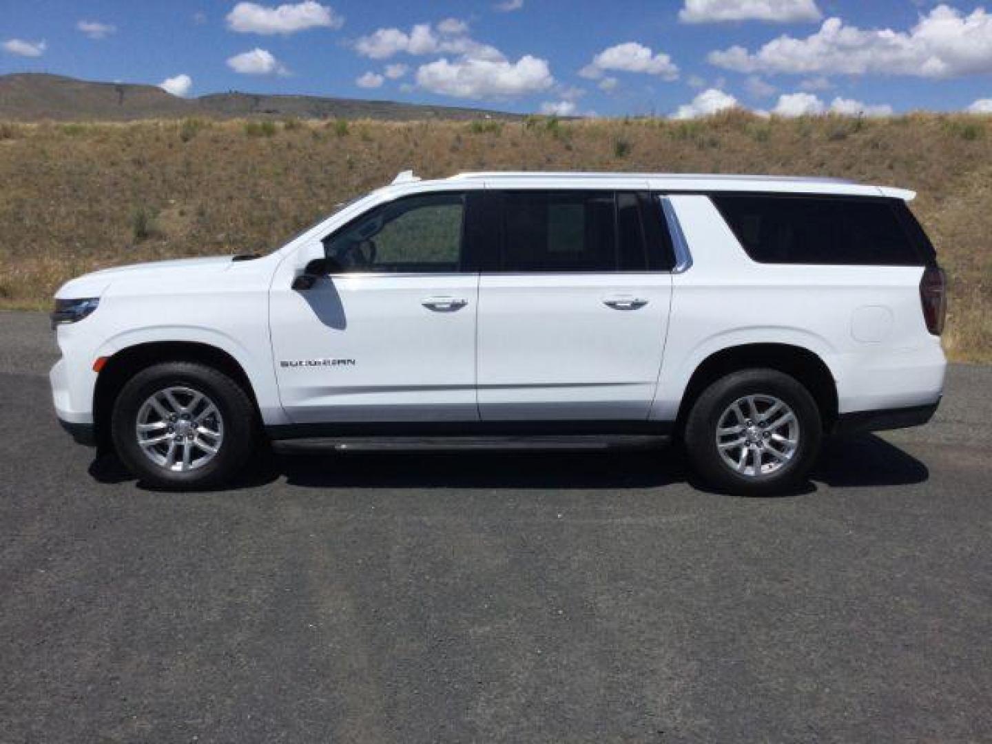 2023 Summit White /Jet Black Chevrolet Suburban 4WD LT (1GNSKCKD2PR) with an EcoTec3 5.3L V-8 gasoline direct injection engine, 10 speed automatic transmission, located at 1801 Main Street, Lewiston, 83501, (208) 743-9371, 46.417065, -117.004799 - Photo#2