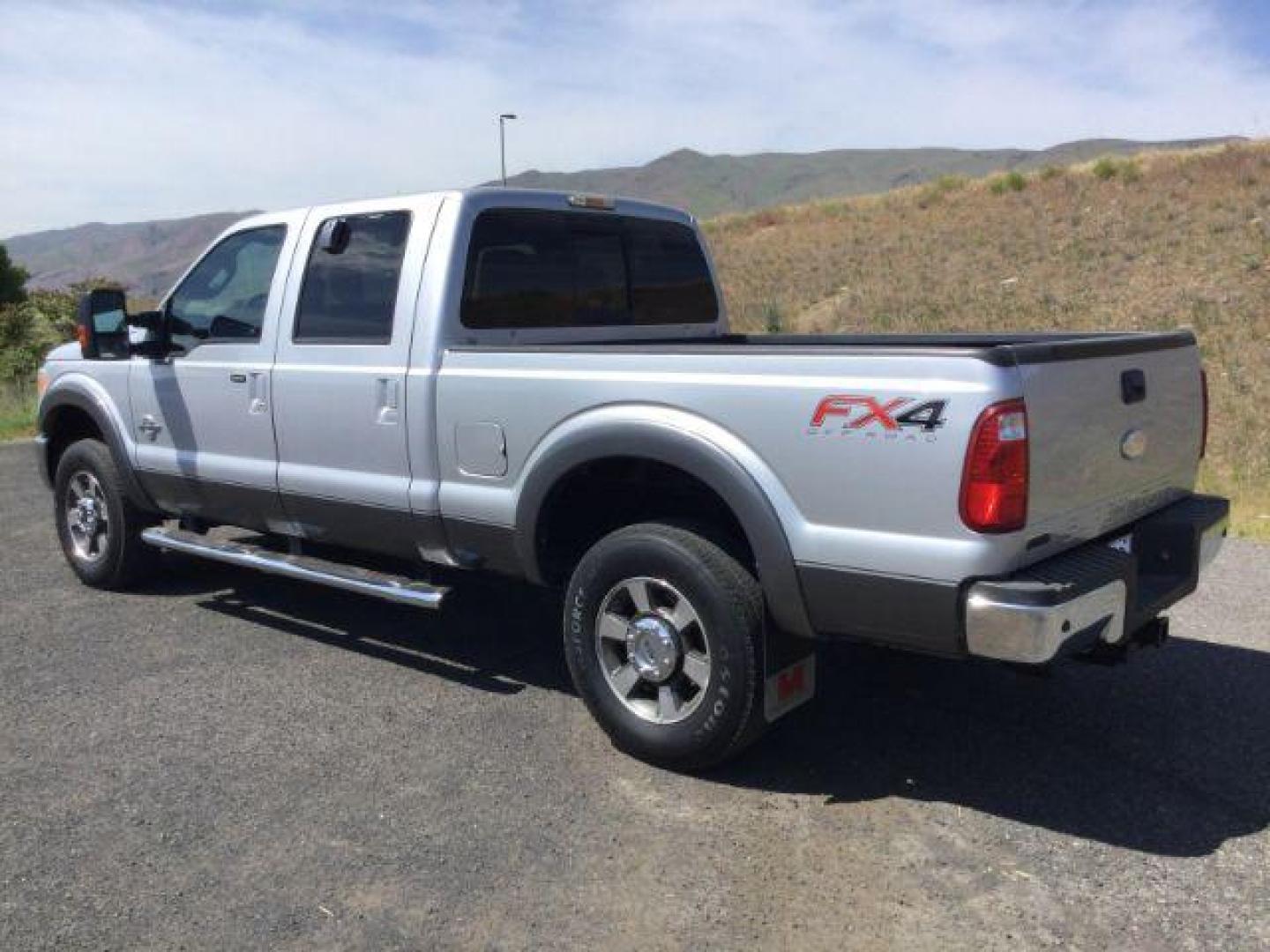 2012 Ingot Silver Metallic /Black Ford F-250 LARIAT (1FT7W2BT1CE) with an Powerstroke 6.7L V-8 diesel direct injection engine, 6-Speed Automatic transmission, located at 1801 Main Street, Lewiston, 83501, (208) 743-9371, 46.417065, -117.004799 - Photo#2