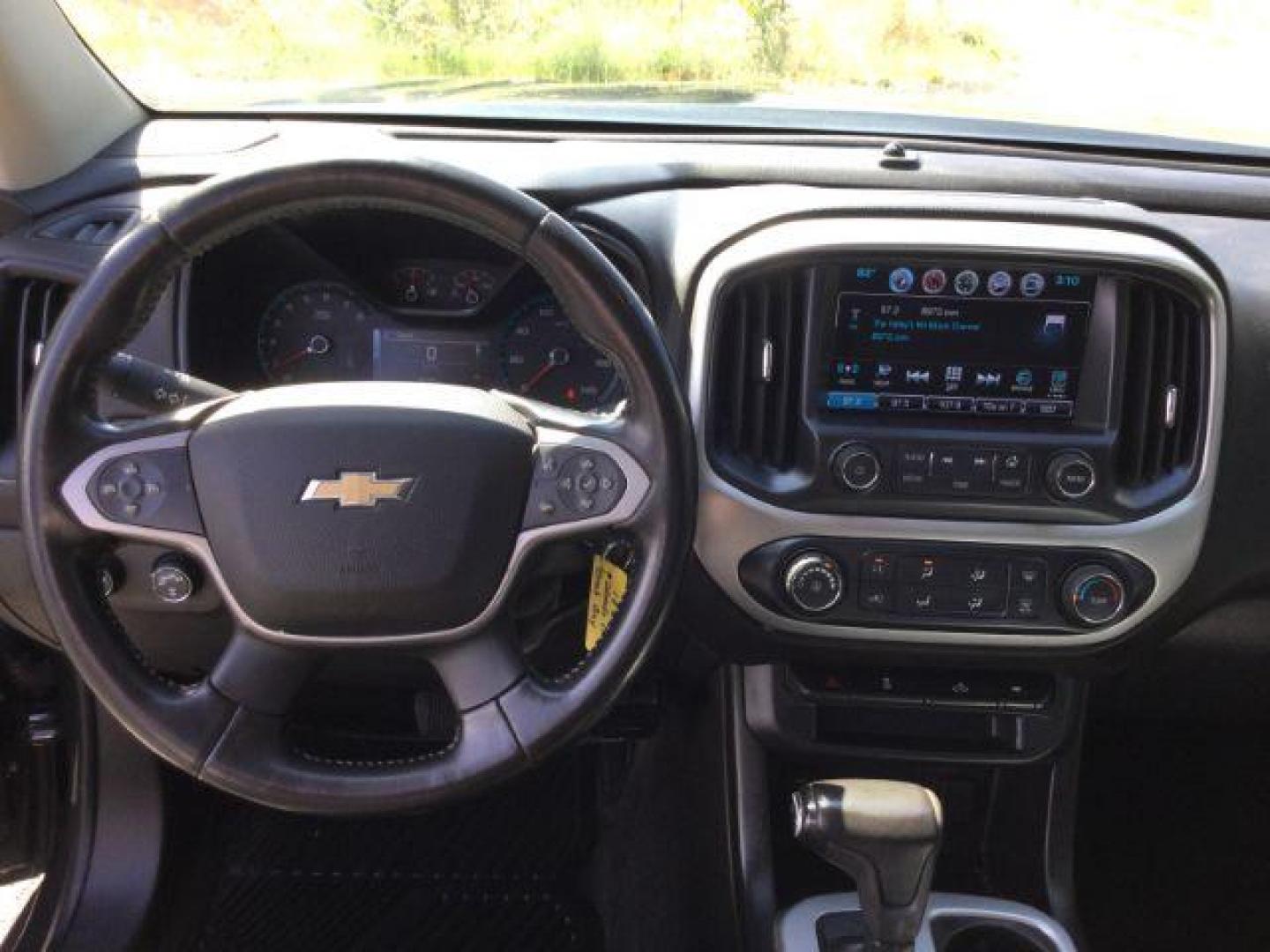 2018 Graphite Metallic /Jet Black/Dark Ash Chevrolet Colorado LT (1GCHTCEN1J1) with an 3.6L V-6 gasoline direct injection engine, 6-Speed Automatic transmission, located at 1801 Main Street, Lewiston, 83501, (208) 743-9371, 46.417065, -117.004799 - Photo#7