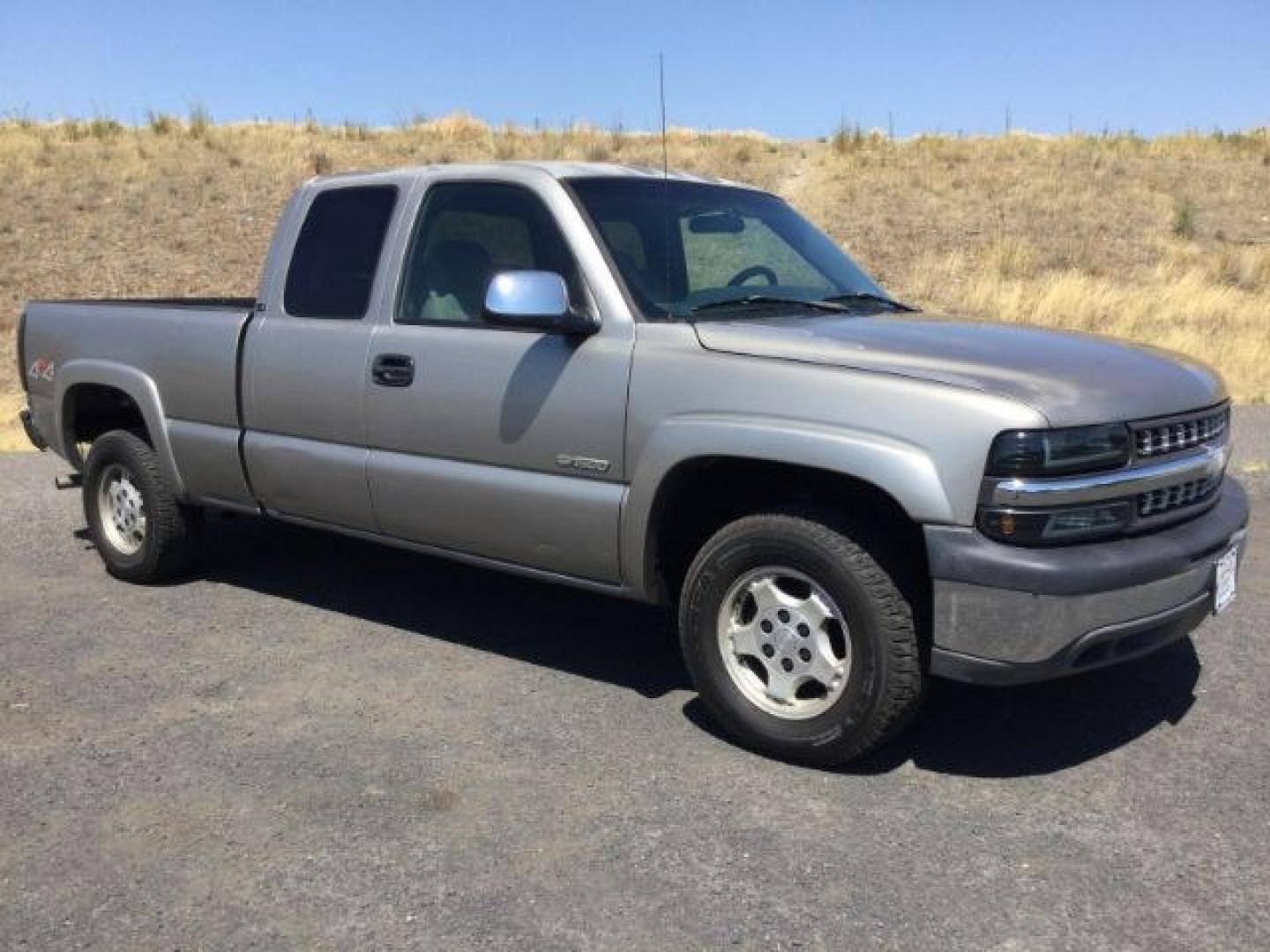 2002 Light Pewter Metallic /Graphite Chevrolet Silverado 1500 LS (1GCEK19T22Z) with an Vortec 5.3L V-8 regular unleaded engine, 4 speed Automatic transmission, located at 1801 Main Street, Lewiston, 83501, (208) 743-9371, 46.417065, -117.004799- Photo#0