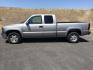 2002 Light Pewter Metallic /Graphite Chevrolet Silverado 1500 LS (1GCEK19T22Z) with an Vortec 5.3L V-8 regular unleaded engine, 4 speed Automatic transmission, located at 1801 Main Street, Lewiston, 83501, (208) 743-9371, 46.417065, -117.004799- Photo#2
