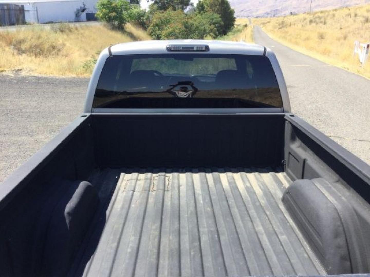 2002 Light Pewter Metallic /Graphite Chevrolet Silverado 1500 LS (1GCEK19T22Z) with an Vortec 5.3L V-8 regular unleaded engine, 4 speed Automatic transmission, located at 1801 Main Street, Lewiston, 83501, (208) 743-9371, 46.417065, -117.004799- Photo#7