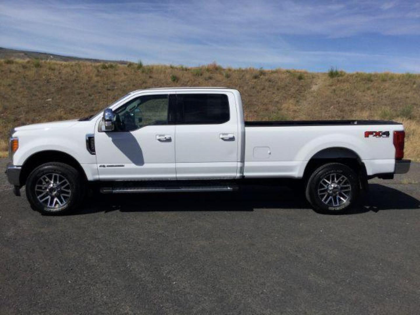 2019 Oxford White /Black Ford F-350 Lariat Crew Cab 4WD (1FT8W3BT9KE) with an Powerstroke 6.7L V-8 diesel direct injection engine, 6-Speed Automatic transmission, located at 1801 Main Street, Lewiston, 83501, (208) 743-9371, 46.417065, -117.004799 - Photo#12