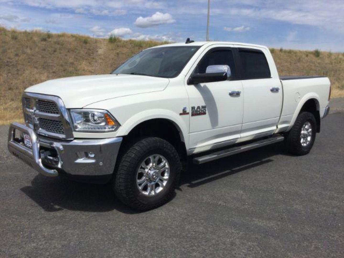 2018 Pearl White /Black, leather RAM 2500 Laramie Crew Cab SWB 4WD (3C6UR5FL4JG) with an 6.7L L6 OHV 24V TURBO DIESEL engine, 6-Speed Automatic transmission, located at 1801 Main Street, Lewiston, 83501, (208) 743-9371, 46.417065, -117.004799 - Photo#1