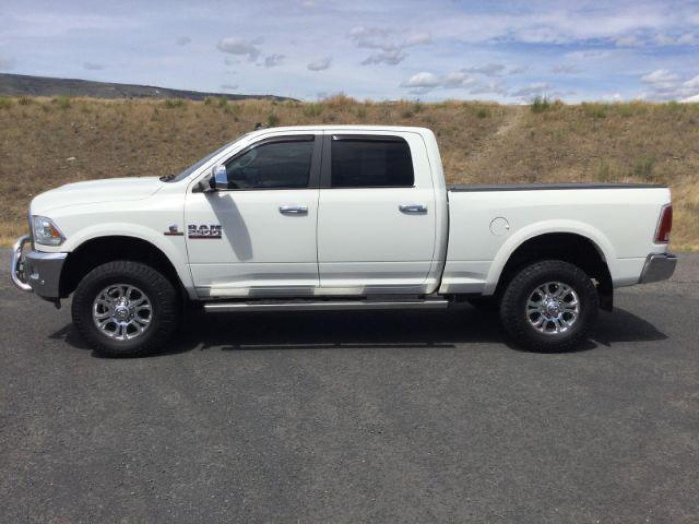 2018 Pearl White /Black, leather RAM 2500 Laramie Crew Cab SWB 4WD (3C6UR5FL4JG) with an 6.7L L6 OHV 24V TURBO DIESEL engine, 6-Speed Automatic transmission, located at 1801 Main Street, Lewiston, 83501, (208) 743-9371, 46.417065, -117.004799 - Photo#2