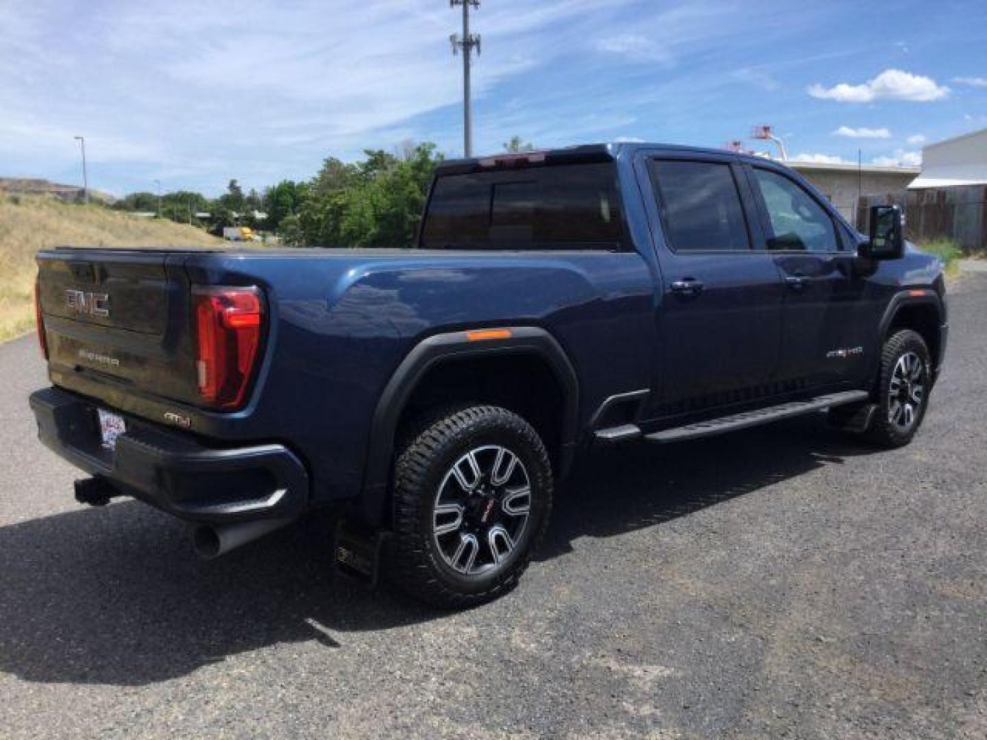 2022 Pacific Blue Metallic /Jet Black w/Kalahari Accents GMC Sierra 2500HD AT4 (1GT49PEY2NF) with an 6.6L V-8 gasoline direct injection engine, 10-speed automatic transmission, located at 1801 Main Street, Lewiston, 83501, (208) 743-9371, 46.417065, -117.004799 - Photo#15