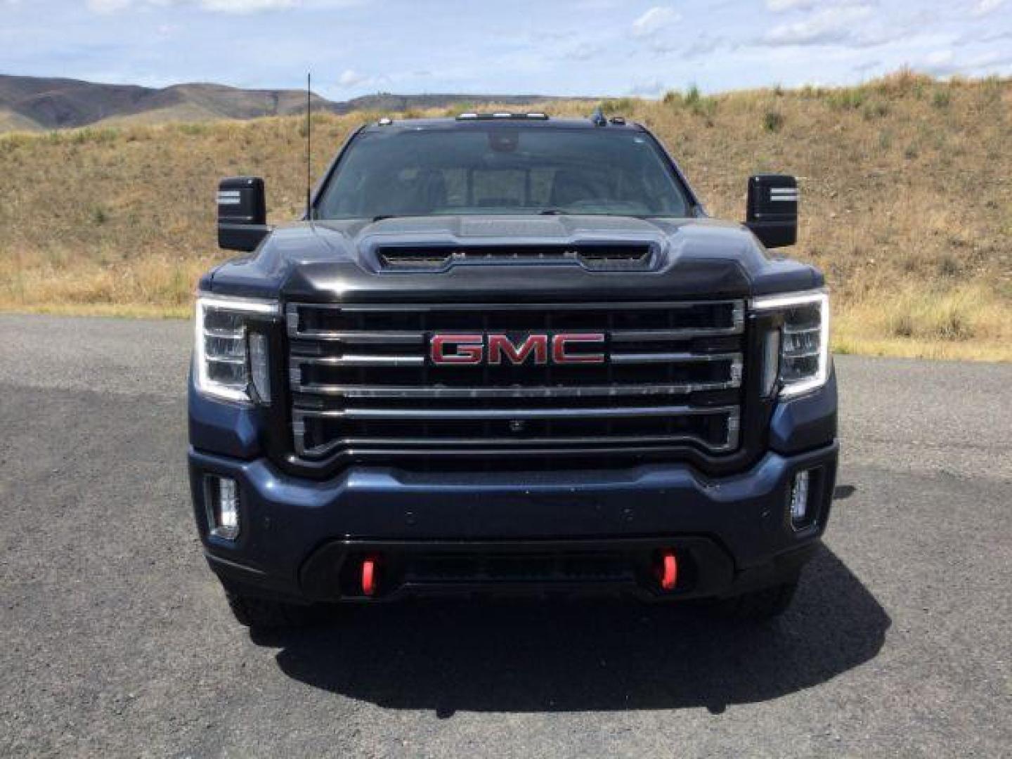 2022 Pacific Blue Metallic /Jet Black w/Kalahari Accents GMC Sierra 2500HD AT4 (1GT49PEY2NF) with an 6.6L V-8 gasoline direct injection engine, 10-speed automatic transmission, located at 1801 Main Street, Lewiston, 83501, (208) 743-9371, 46.417065, -117.004799 - Photo#17