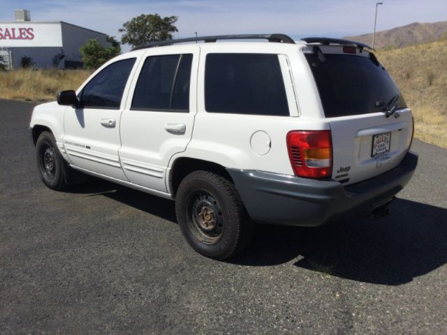 2003 Stone White Clearcoat /Dark Slate Gray Jeep Grand Cherokee Limited (1J8GW58N53C) with an Power Tech 4.7L V-8 regular unleaded engine, Automatic transmission, located at 1801 Main Street, Lewiston, 83501, (208) 743-9371, 46.417065, -117.004799- Photo#13