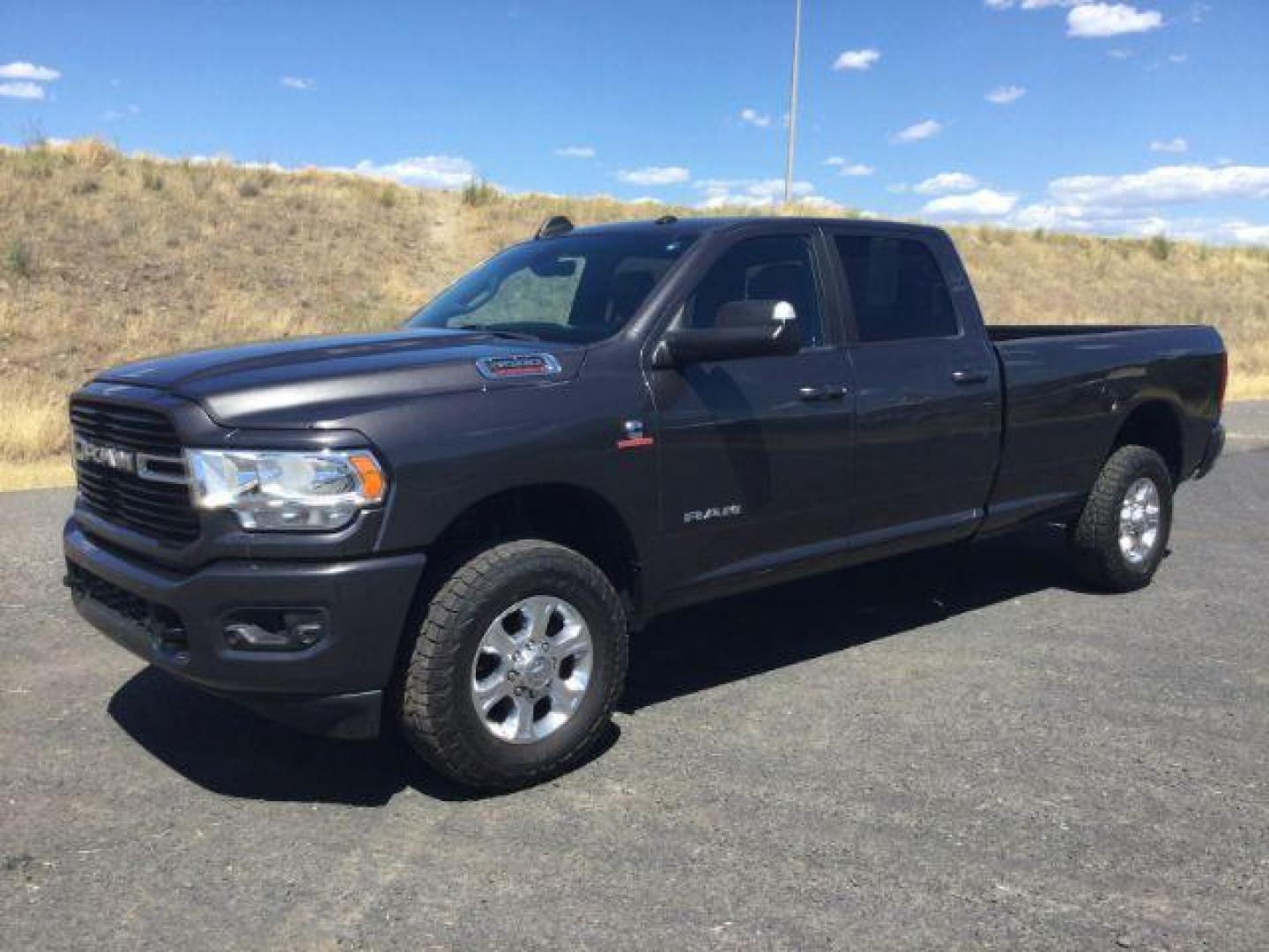2019 Granite Crystal Metallic Clearcoat /Diesel Gray/Black Ram 3500 Big Horn Crew Cab 4x4 8' Box (3C63R3HL1KG) with an Cummins 6.7L I-6 diesel direct injection engine, 6-Speed Automatic transmission, located at 1801 Main Street, Lewiston, 83501, (208) 743-9371, 46.417065, -117.004799- Photo#1