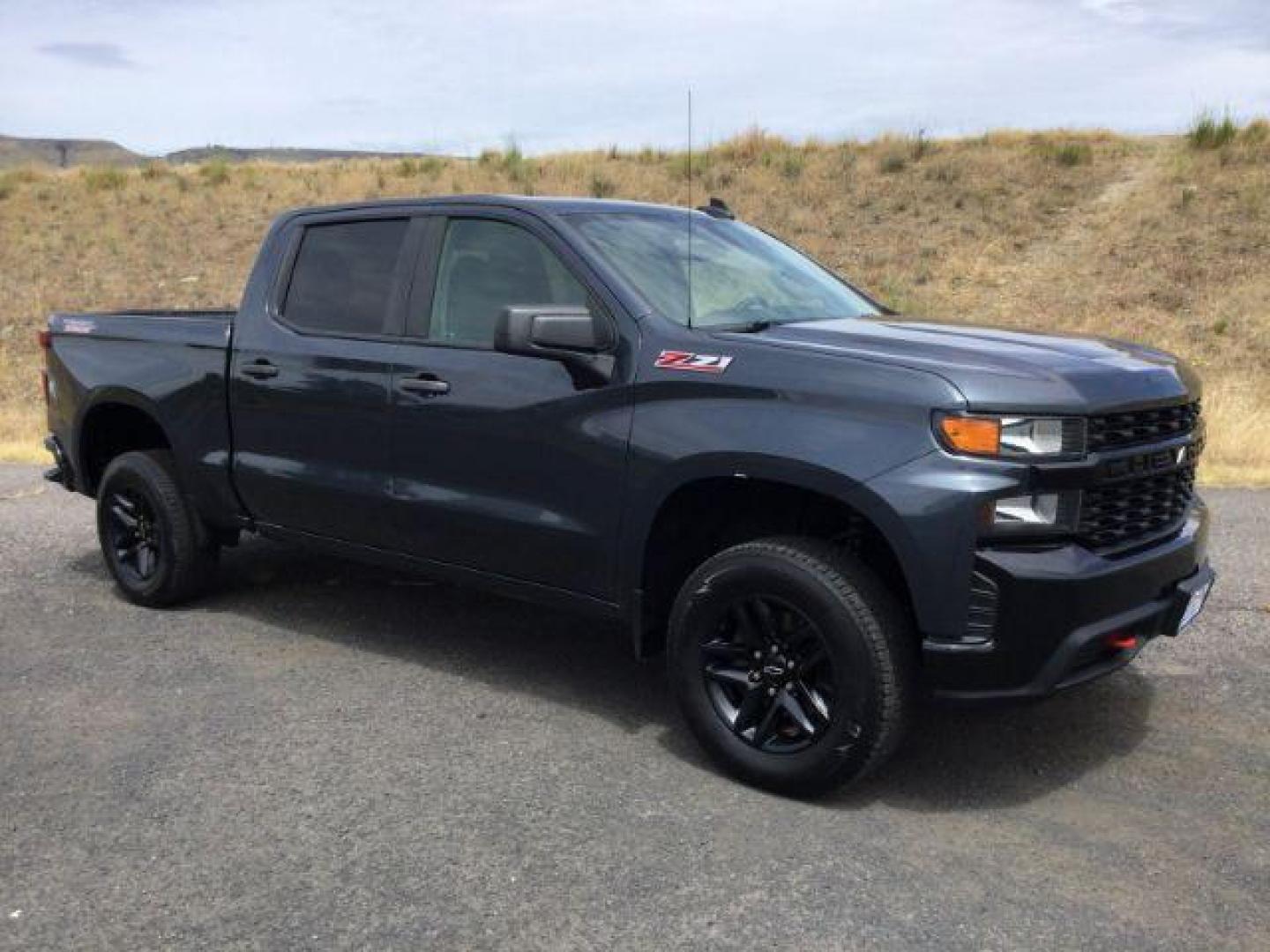 2019 Shadow Gray Metallic /Jet Black Chevrolet Silverado 1500 Custom Trail Boss (1GCPYCEF7KZ) with an EcoTec3 5.3L V-8 gasoline direct injection engine, 8-Speed Automatic transmission, located at 1801 Main Street, Lewiston, 83501, (208) 743-9371, 46.417065, -117.004799 - Photo#1