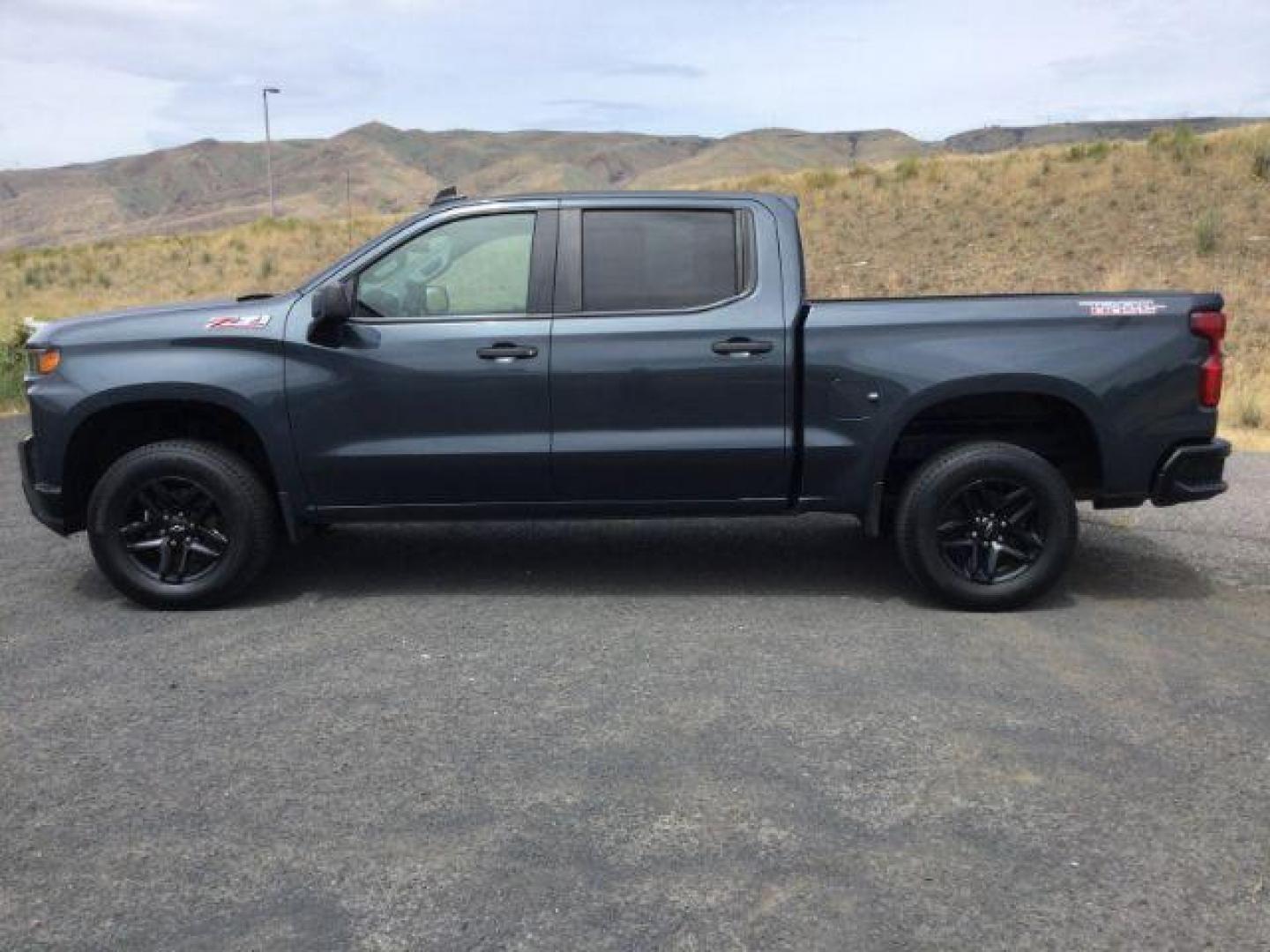 2019 Shadow Gray Metallic /Jet Black Chevrolet Silverado 1500 Custom Trail Boss (1GCPYCEF7KZ) with an EcoTec3 5.3L V-8 gasoline direct injection engine, 8-Speed Automatic transmission, located at 1801 Main Street, Lewiston, 83501, (208) 743-9371, 46.417065, -117.004799 - Photo#2