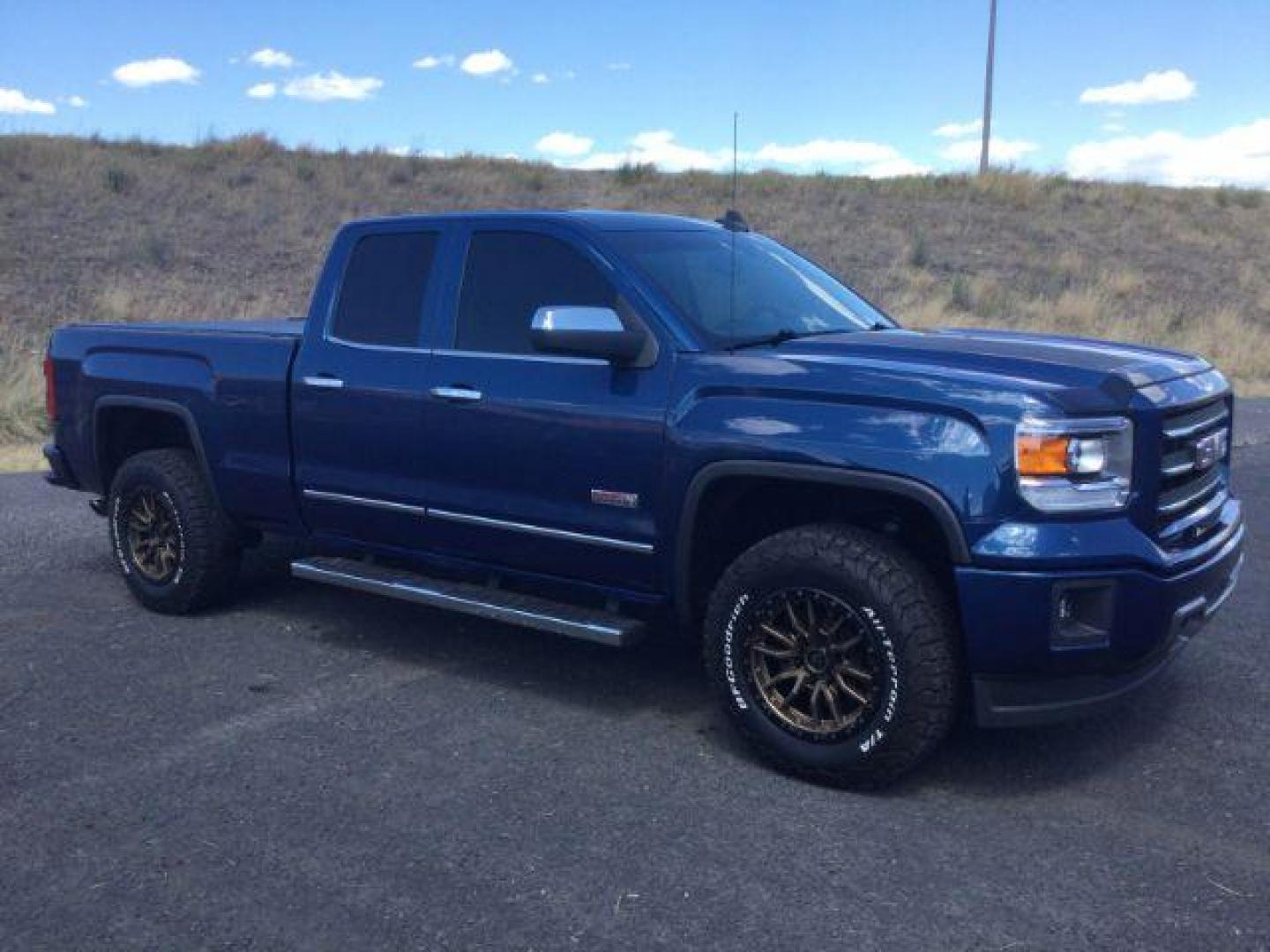 2015 Stone Blue Metallic /Jet Black GMC Sierra 1500 SLT (1GTV2VEC0FZ) with an EcoTec3 6.2L V-8 gasoline direct injection engine, 6-Speed Automatic transmission, located at 1801 Main Street, Lewiston, 83501, (208) 743-9371, 46.417065, -117.004799- Photo#1