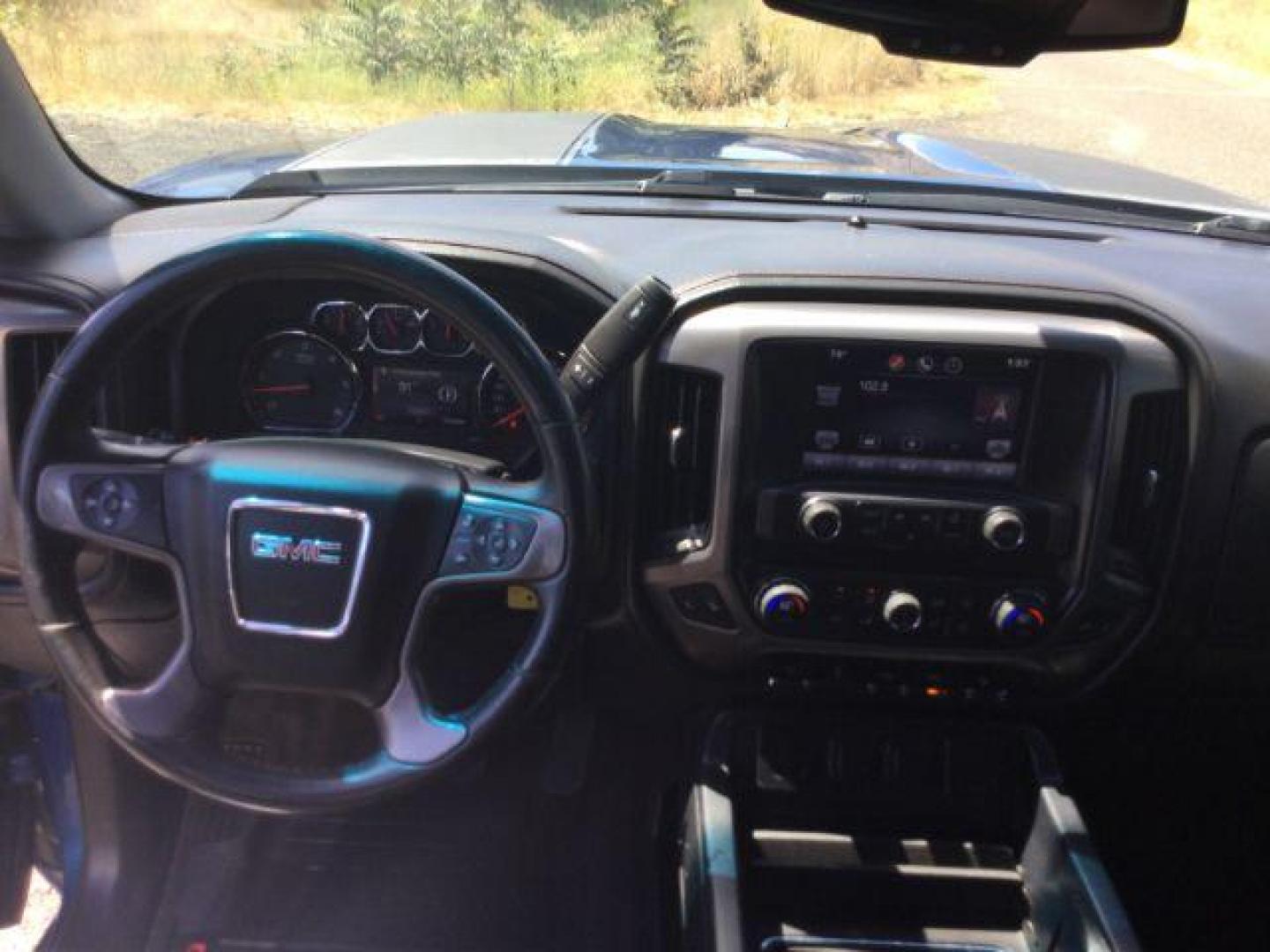 2015 Stone Blue Metallic /Jet Black GMC Sierra 1500 SLT (1GTV2VEC0FZ) with an EcoTec3 6.2L V-8 gasoline direct injection engine, 6-Speed Automatic transmission, located at 1801 Main Street, Lewiston, 83501, (208) 743-9371, 46.417065, -117.004799- Photo#5