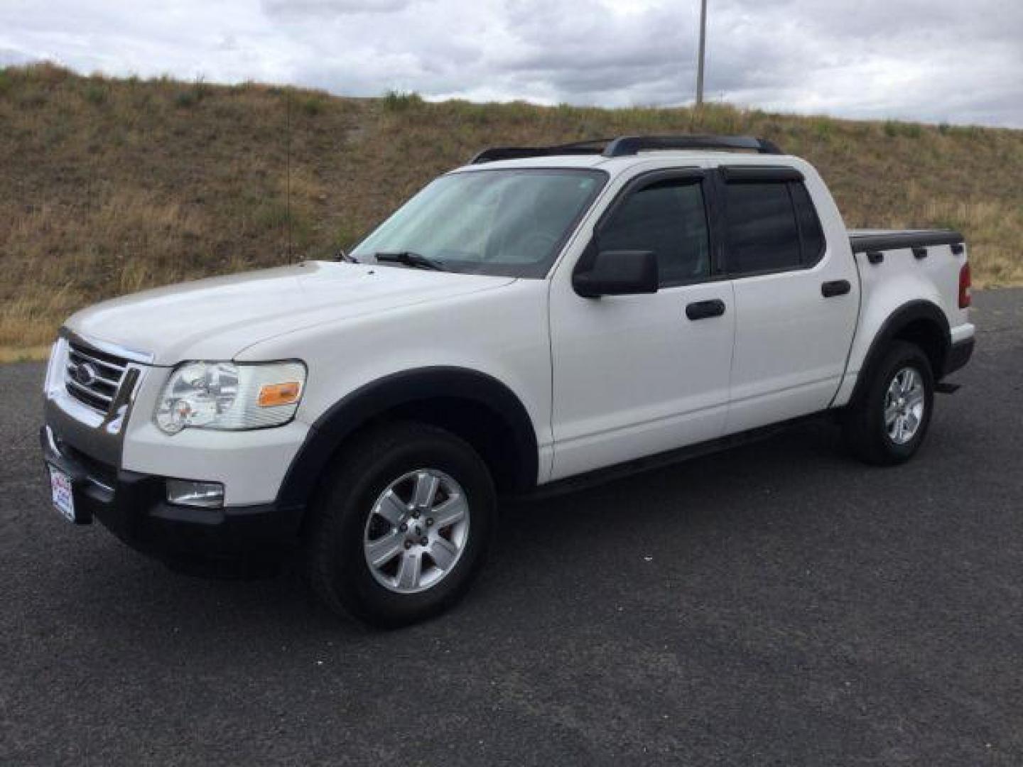 2009 White Suede Clearcoat Ford Explorer Sport Trac XLT (1FMEU51E89U) with an 4L V-6 regular unleaded engine, located at 1801 Main Street, Lewiston, 83501, (208) 743-9371, 46.417065, -117.004799 - Photo#1